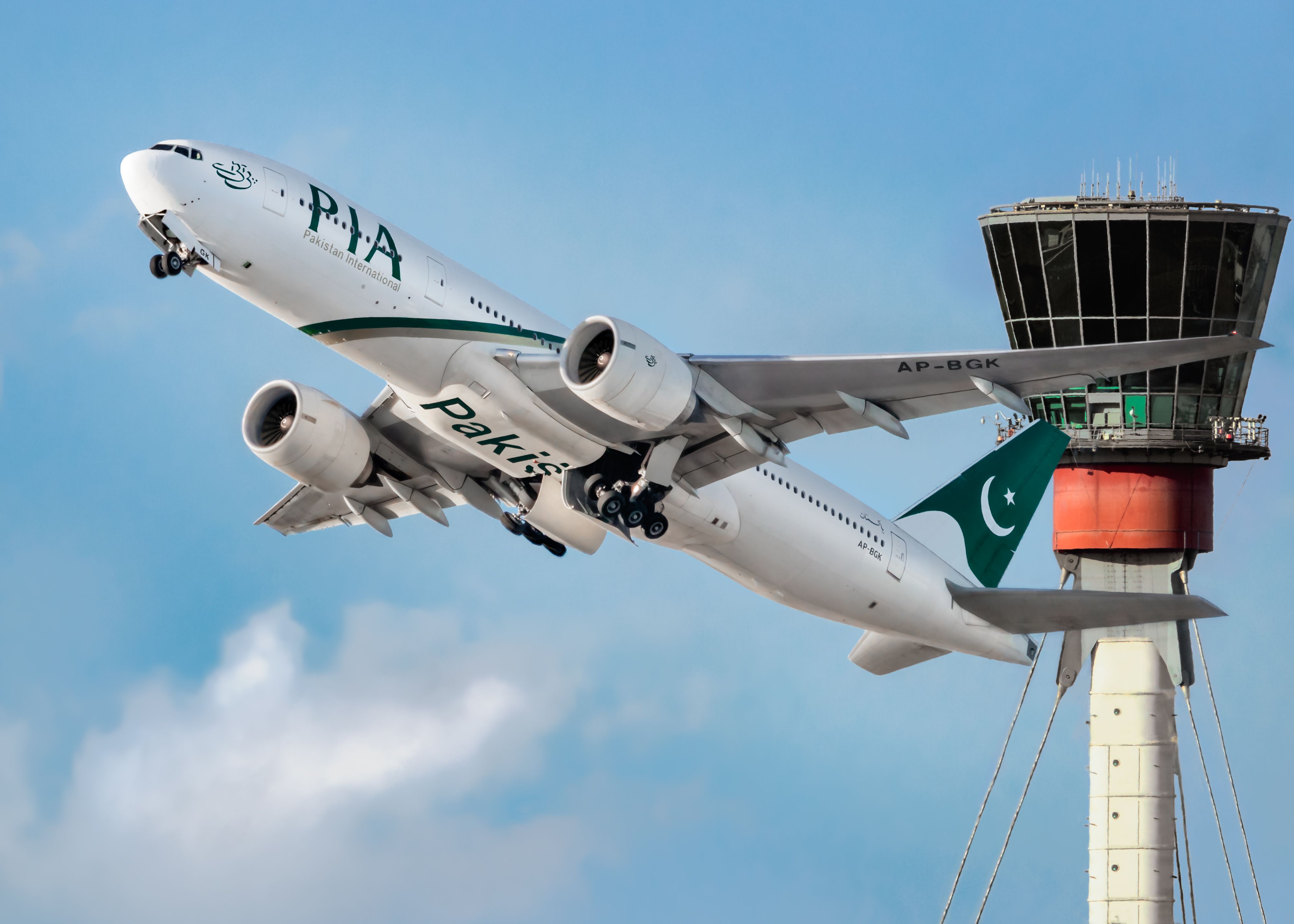 A PIA Boeing 777 taking off from LHR