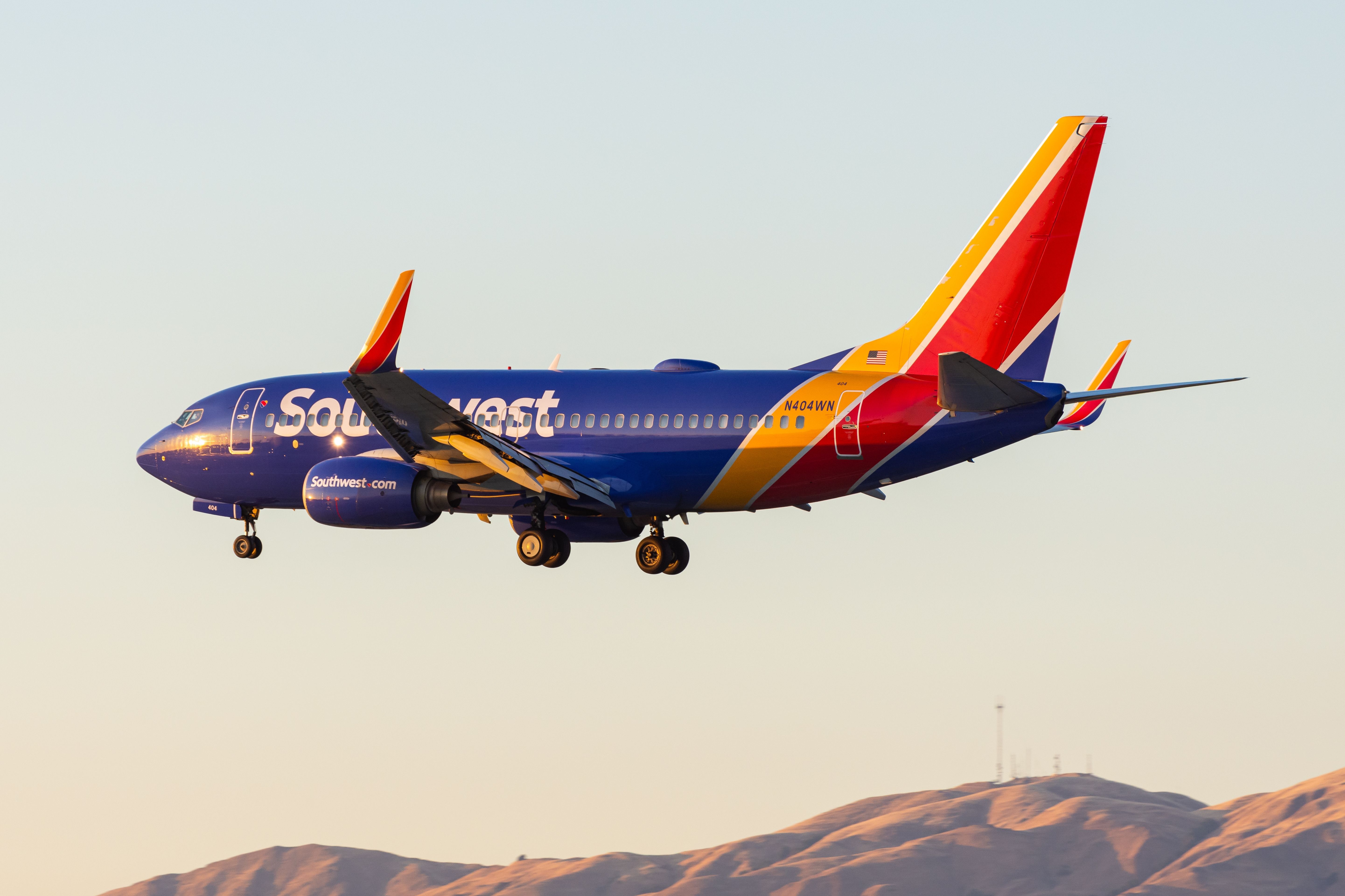 Southwest Airlines Boeing 737-700 in approach for landing at San Jose International Airport (SJC) in beautiful golden California desert.