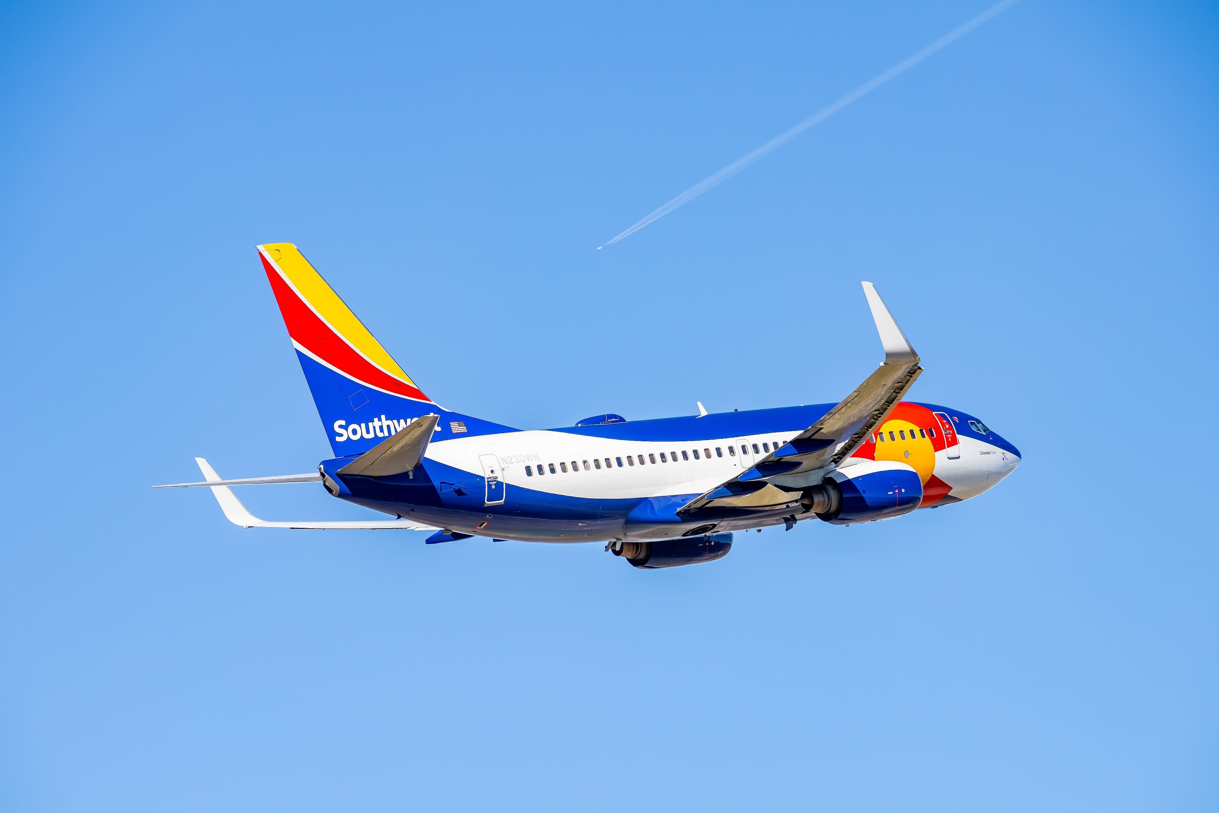 Southwest Airlines Colorado One livery on a Boeing 737-700 departing runway 36R from AUS