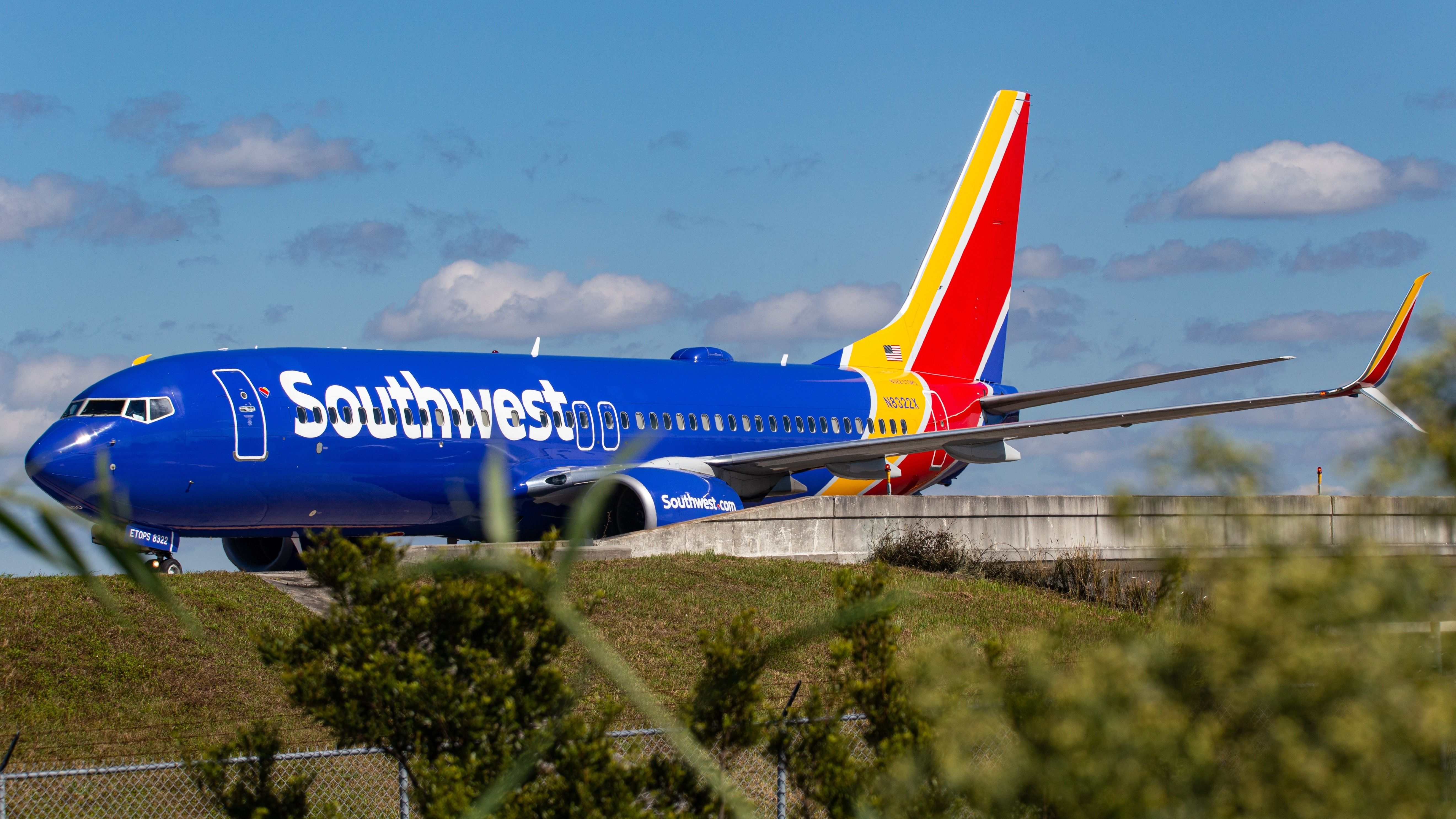 Southwest Airlines Boeing 737-8H4 (N8322X) taxis at Orlando International Airport.