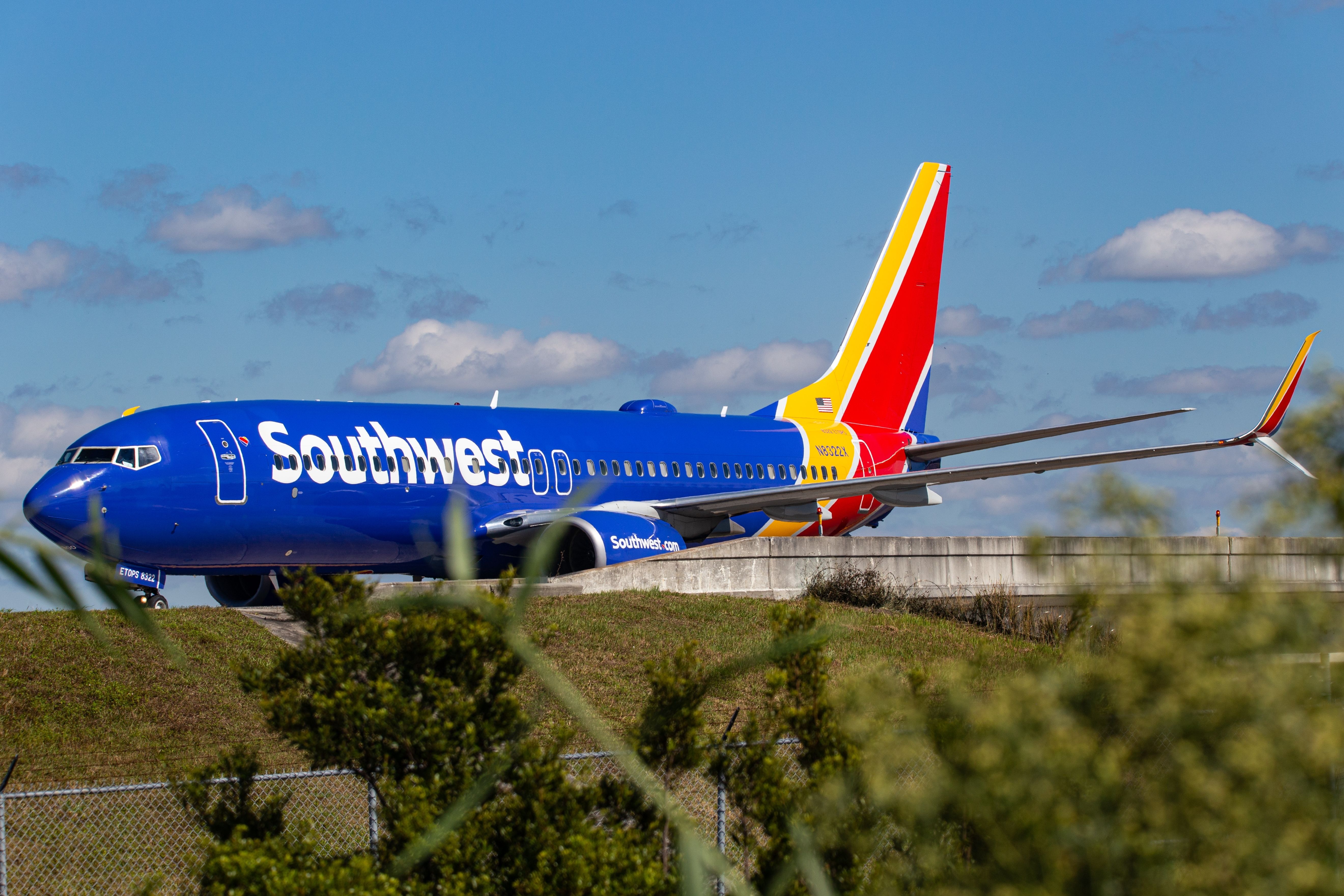 Southwest Airlines Boeing 737-8H4 (N8322X) taxiing at Orlando International Airport.