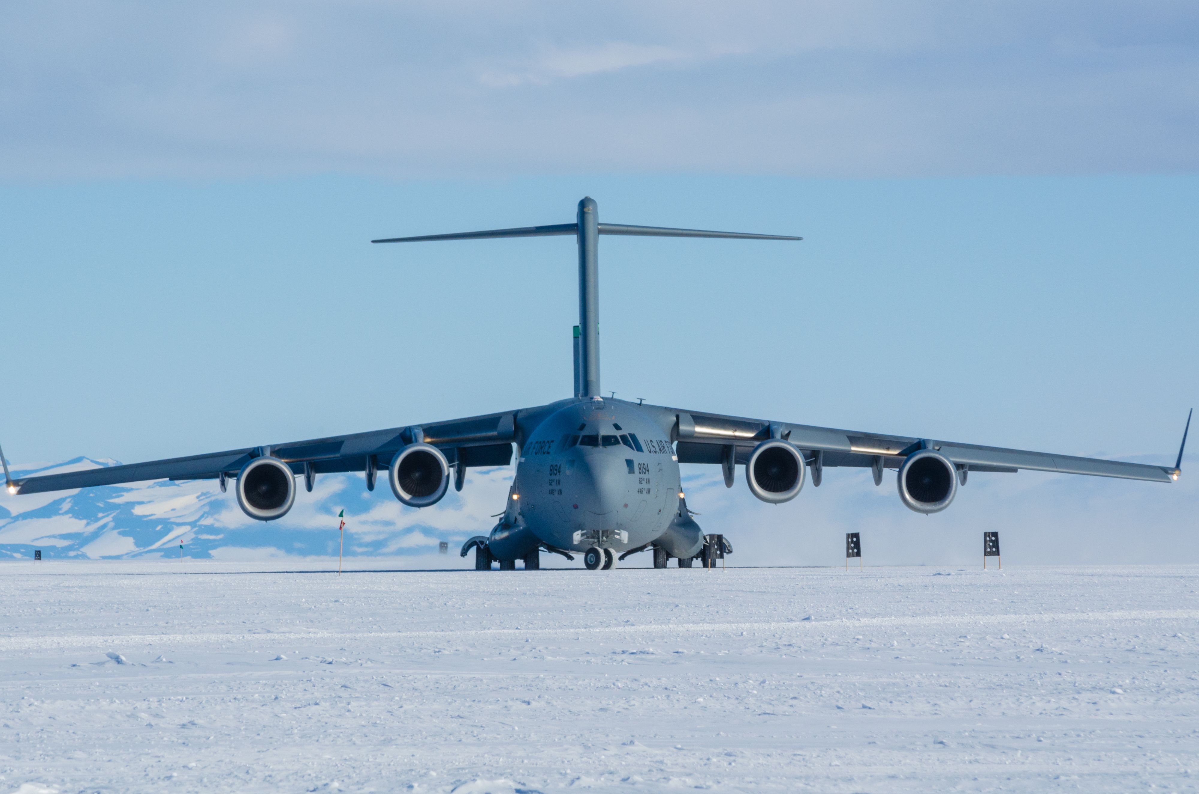 4283718 - C-17 Globemaster performing a turn maneuver on deep snow during certification on airfield Phoenix, located at McMurdo Station, Antarctica on November 15, 2016.