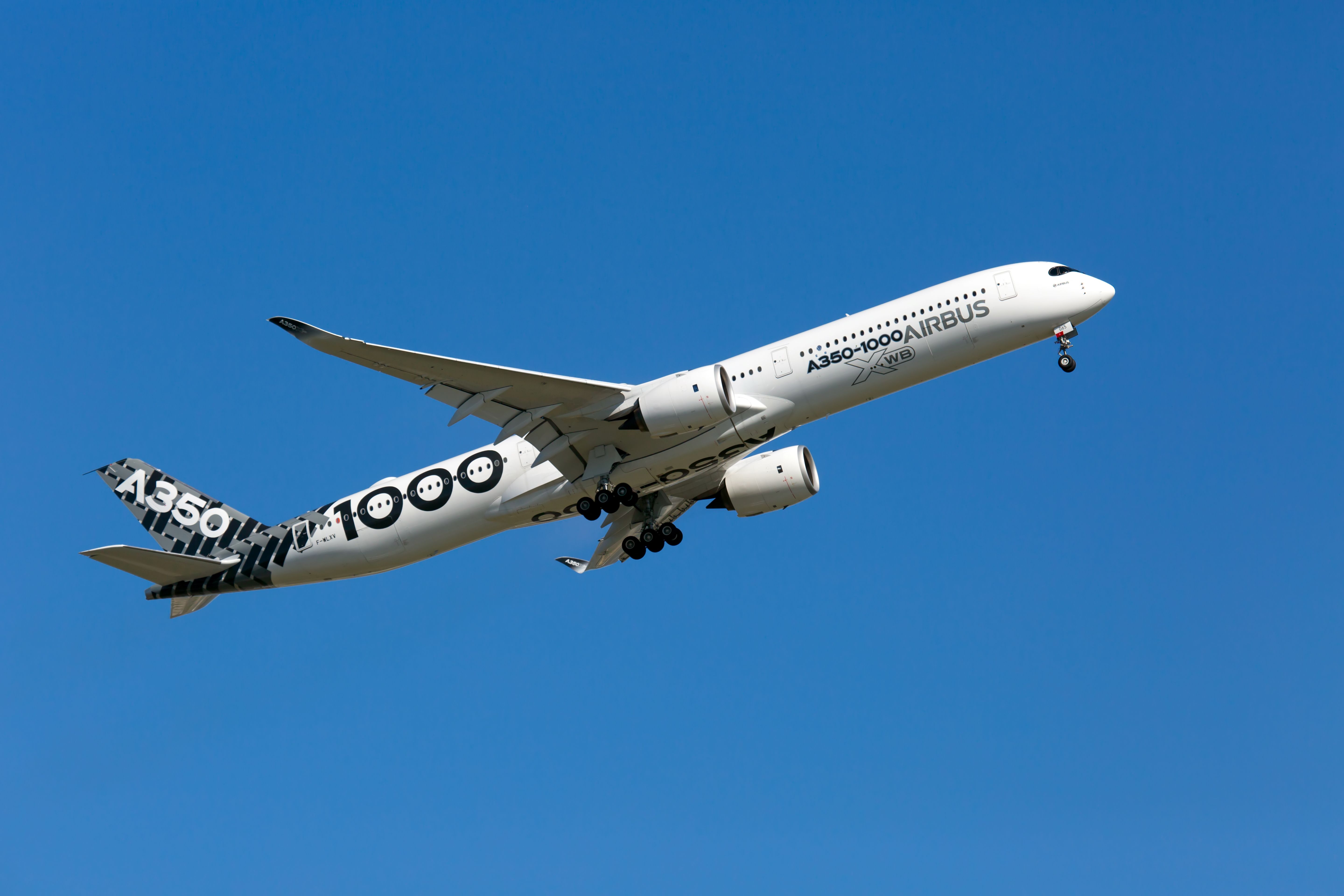 Airbus A350-1000 departing Toulouse Blagnac Airport TLS shutterstock_1185377497