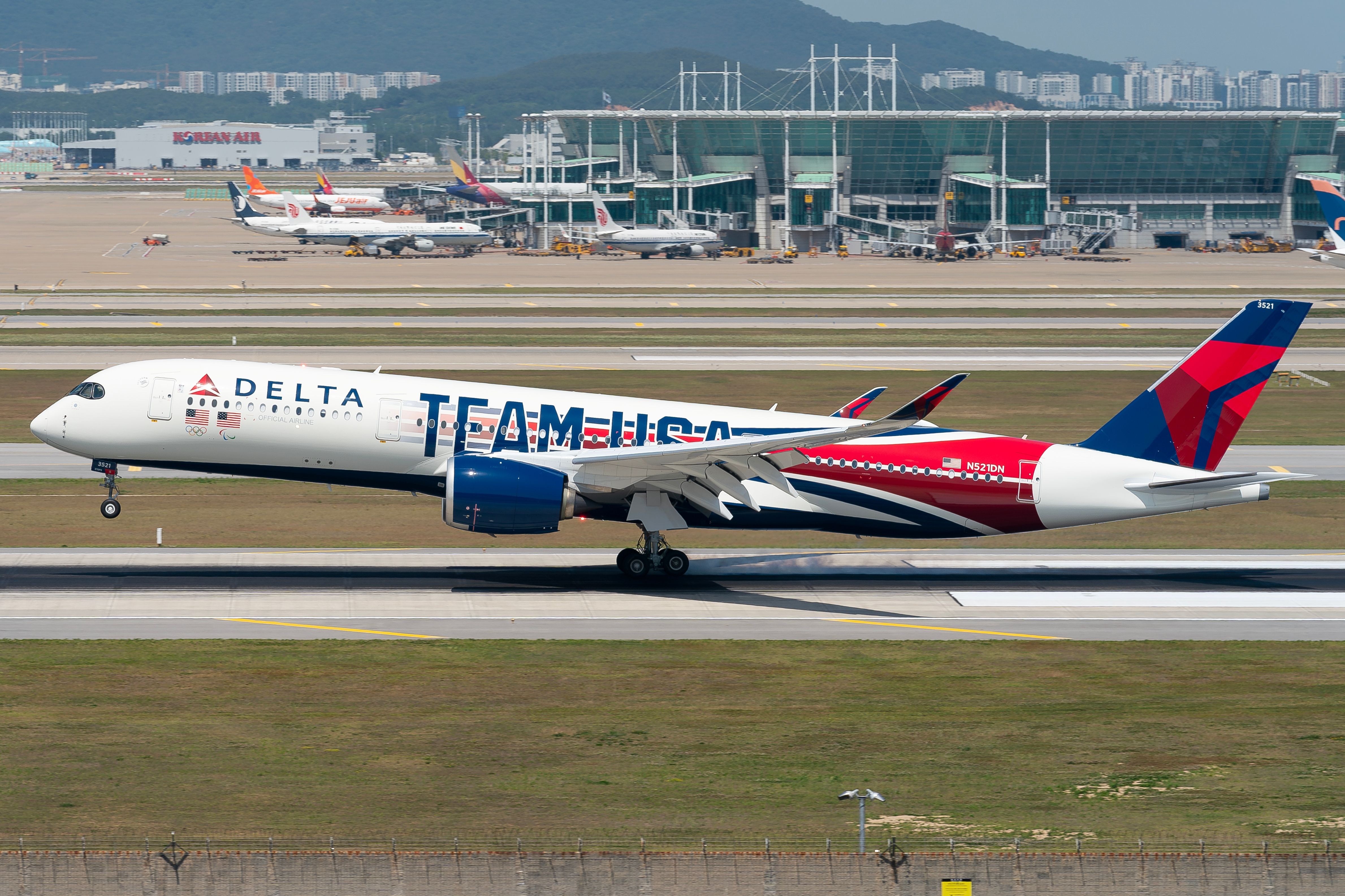 Delta Air Lines TEAM USA Airbus A350-900 landing at Seoul Incheon International Airport ICN shutterstock_2475809449