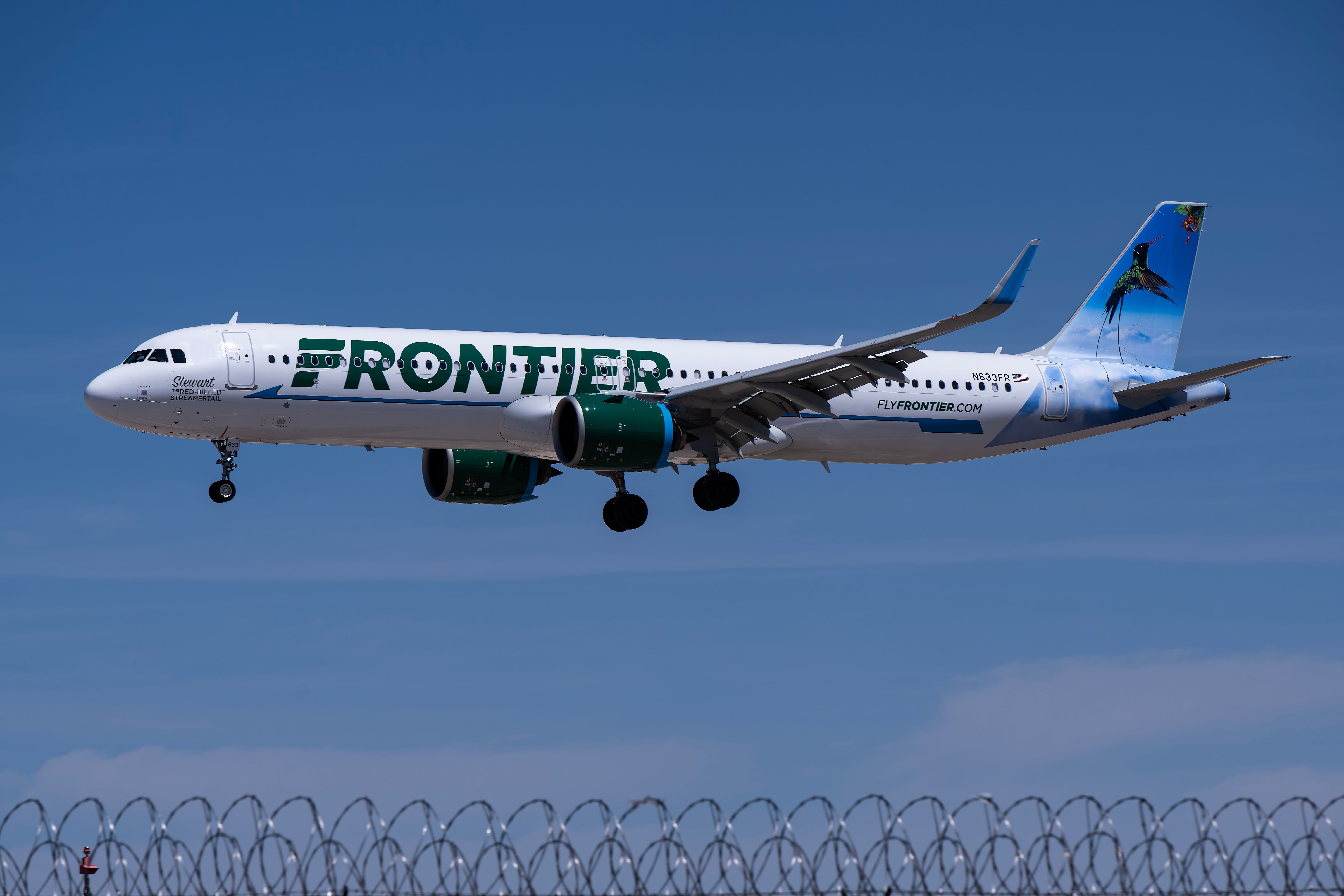 Frontier Airlines Airbus A321neo landing at Harry Reid International Airport LAS shutterstock_2454918277