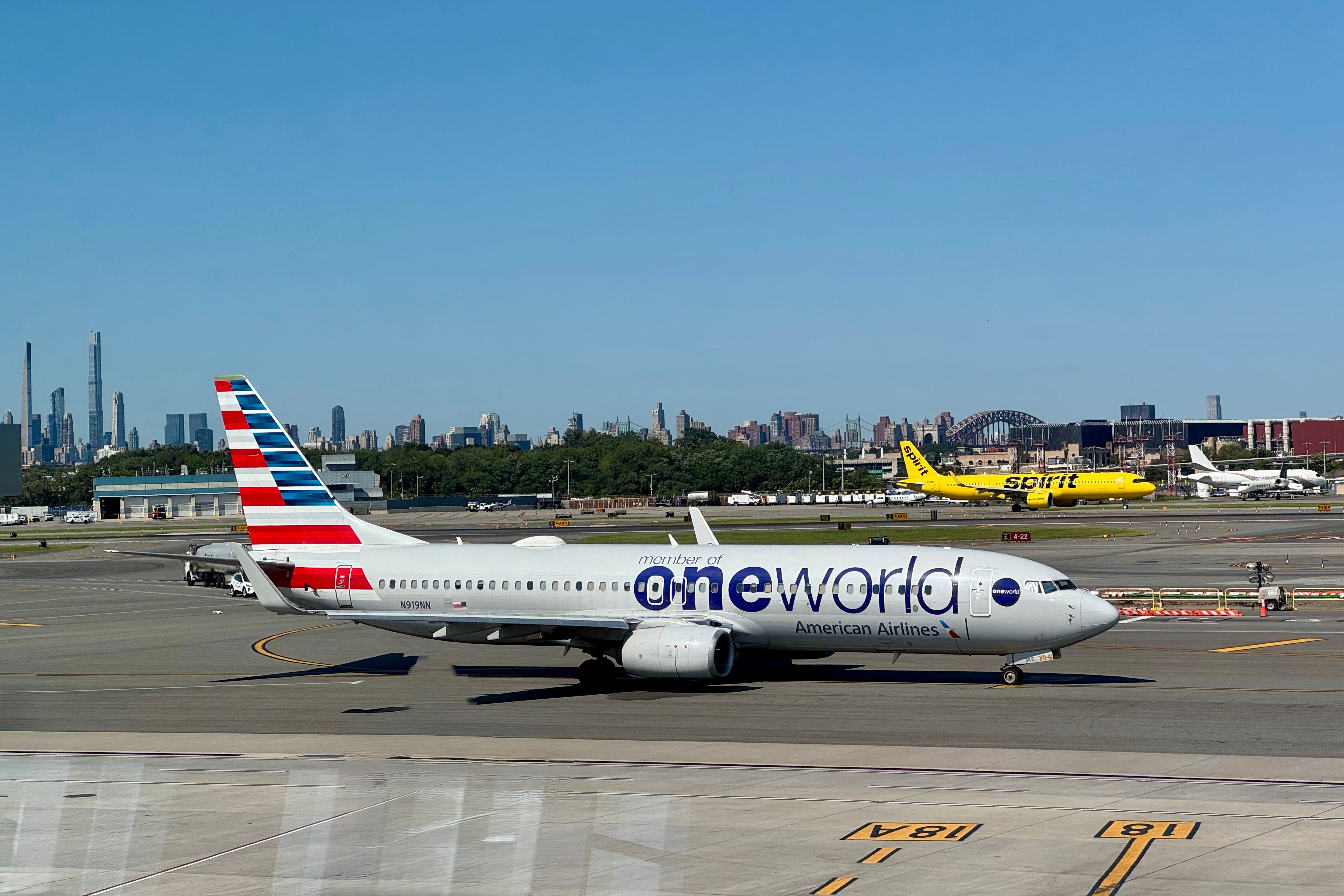 An American Airlines Boeing 737-800 registered N919NN in the oneworld livery at LaGuardia Airport (LGA) in New York City / NYC