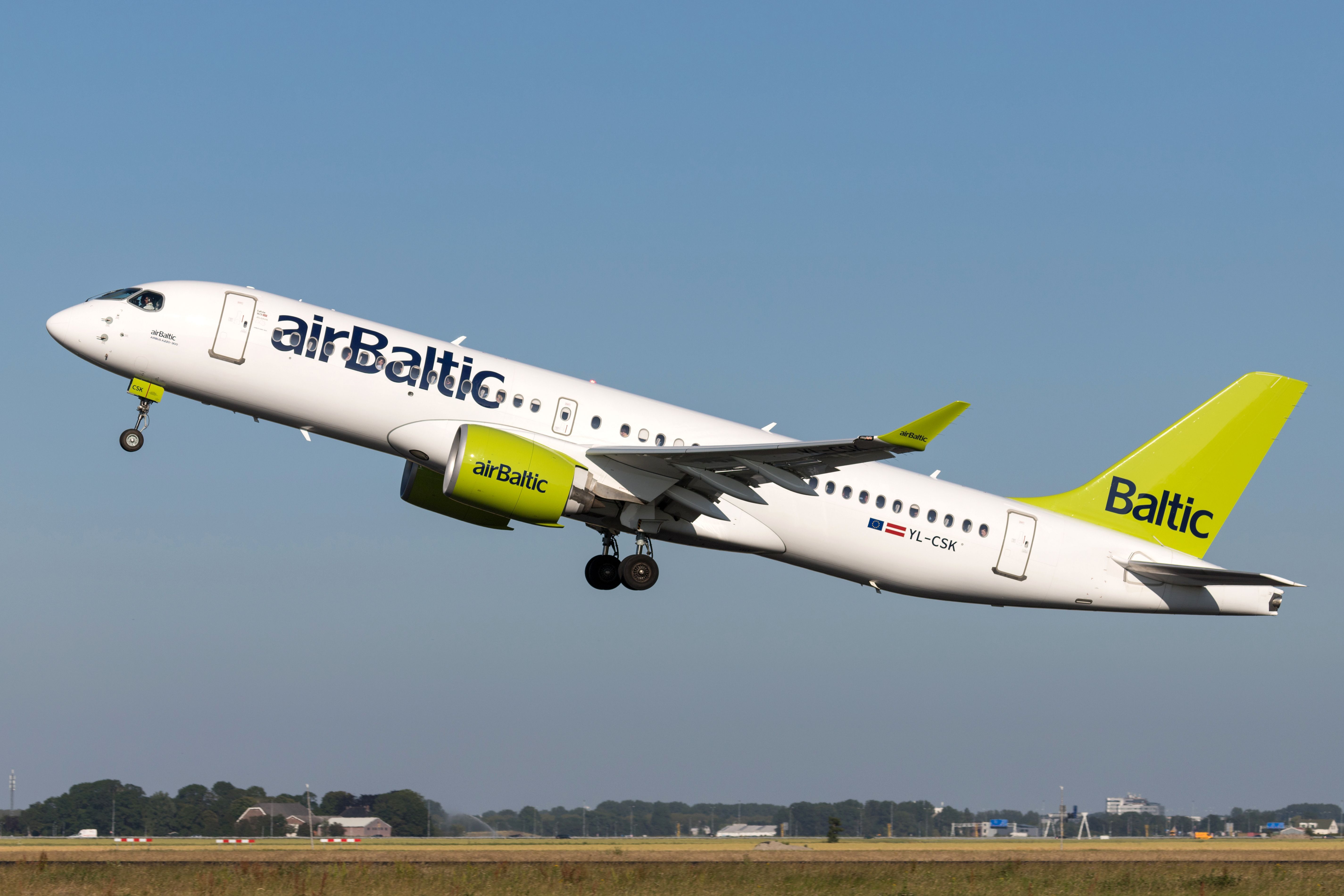 airBaltic Airbus A220 Departing Amsterdam