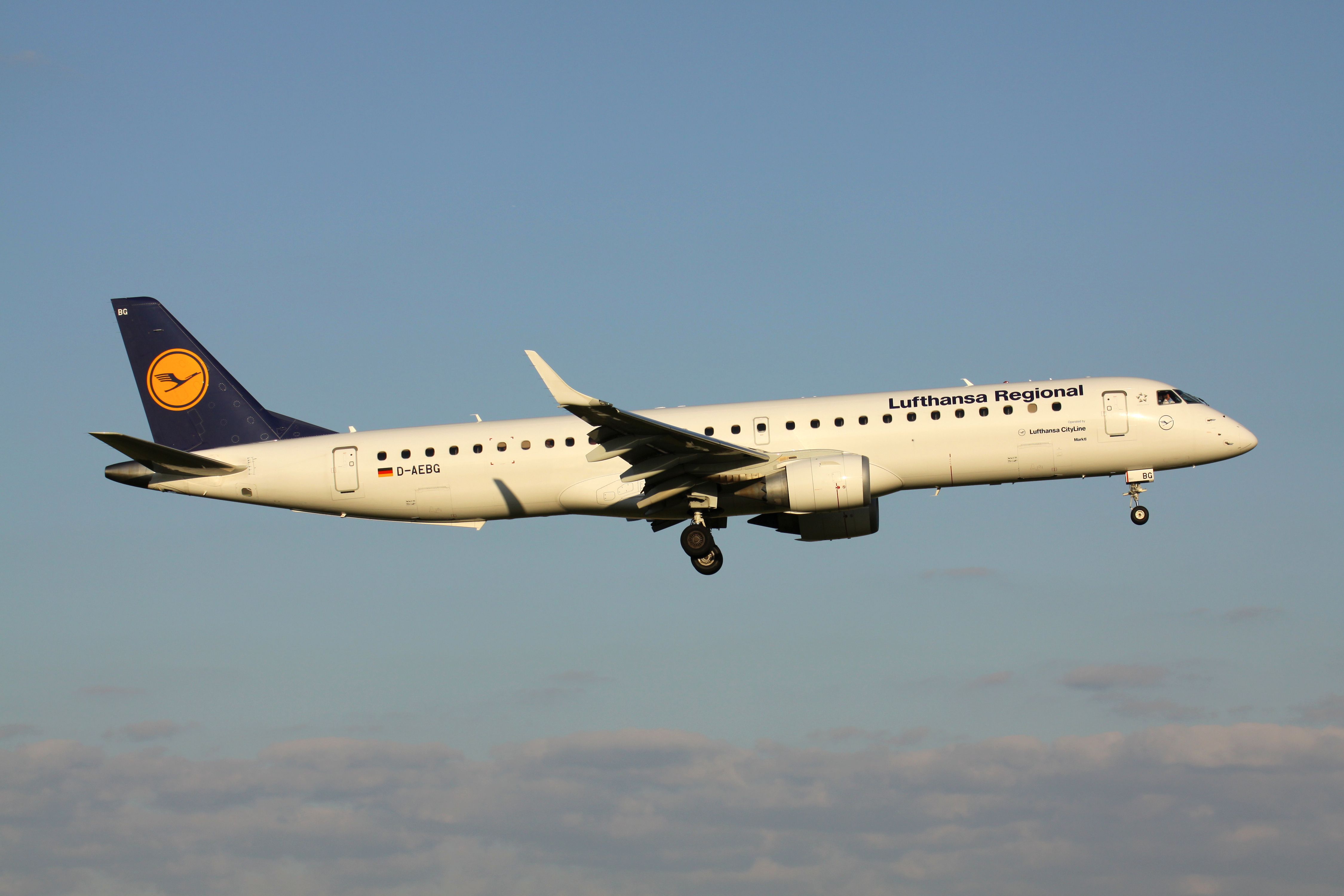 AUGUST 26, 2013: German Lufthansa CityLine Embraer 195 with registration D-AEBG on short final for Amsterdam Airport Schiphol.