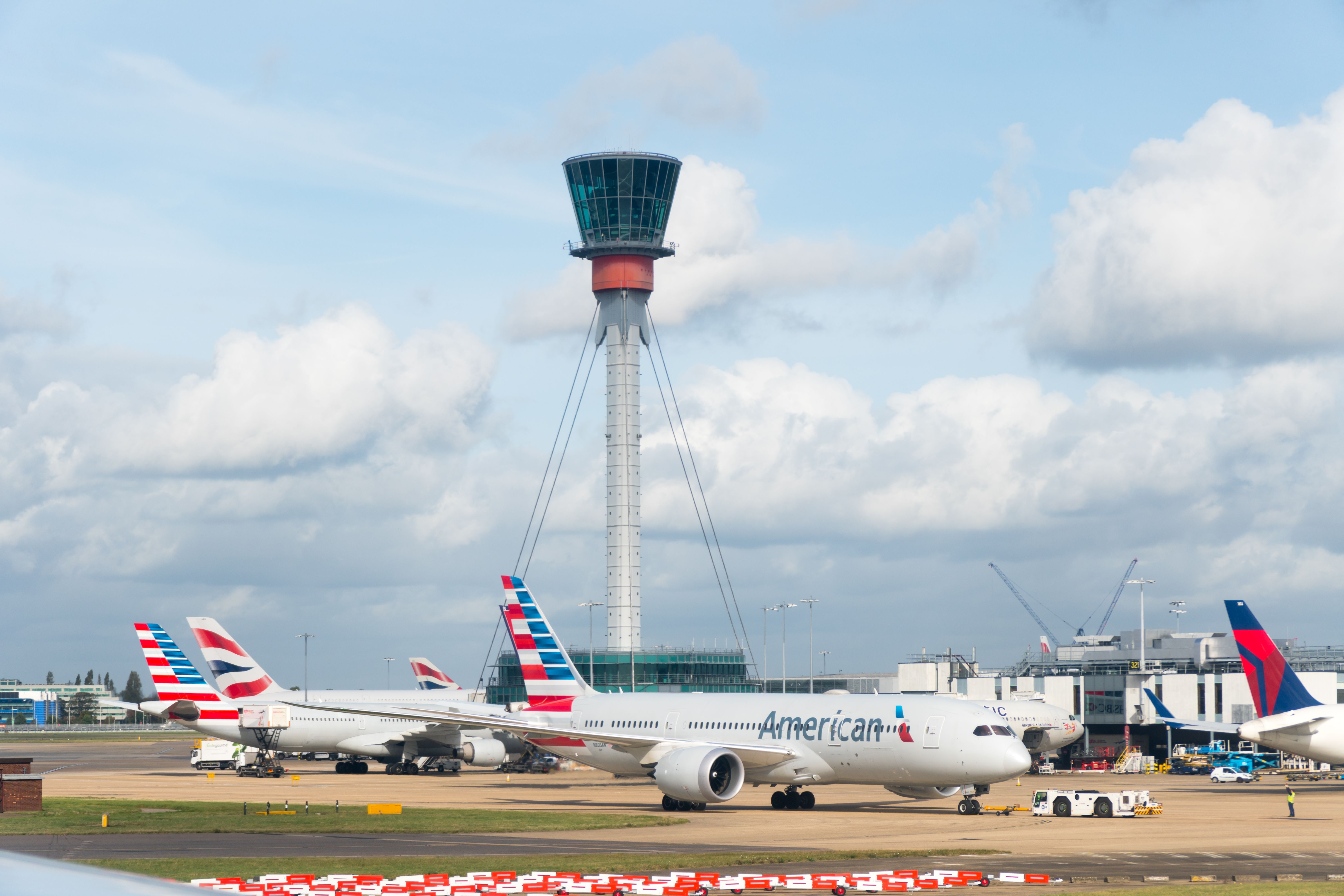 American Airlines Boeing 787 Taxiing Past ATC Tower At Heathrow Airport