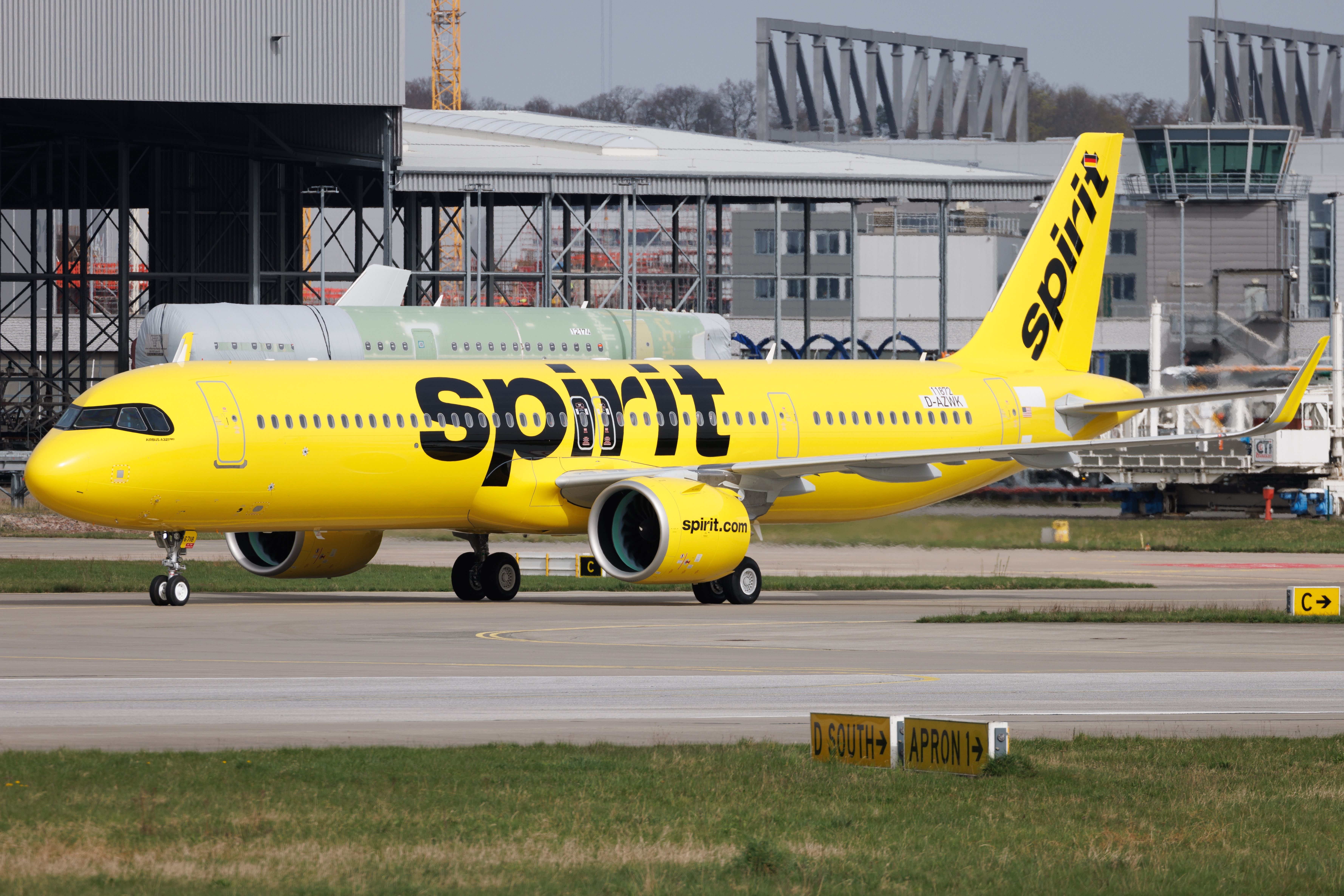 Spirit Airlines Airbus A321neo taxiing at Hamburg Finkenwerder Airport XFW shutterstock_2446541651