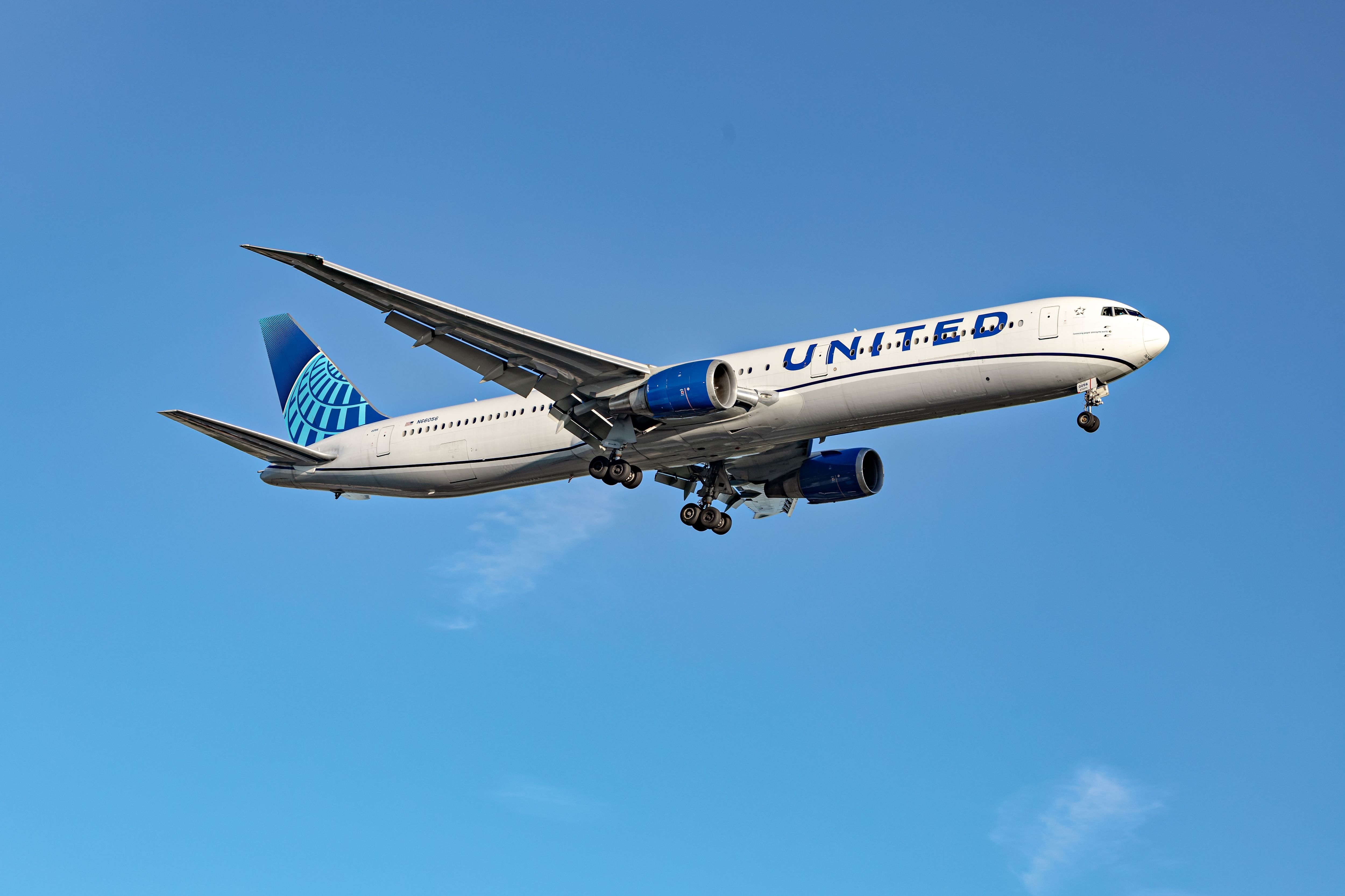 United Airlines Boeing 767 landing at London Heathrow Airport shutterstock_2490792611