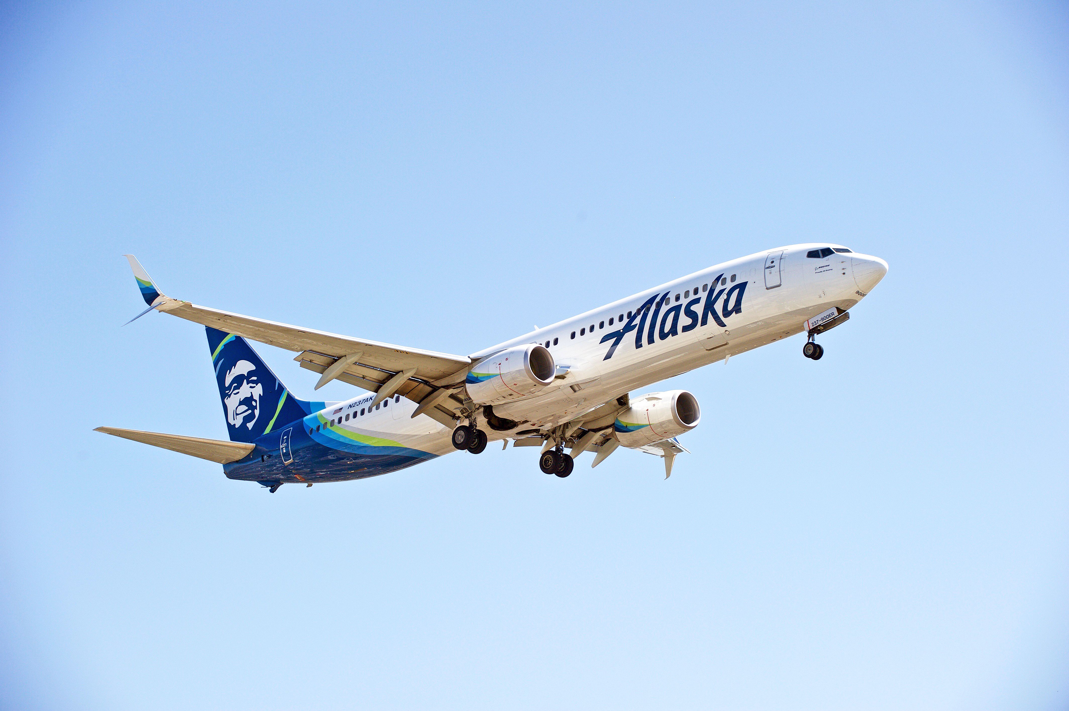 Alaska Airlines Boeing 737-900ER landing at Los Angeles International Airport LAX shutterstock_1511579333