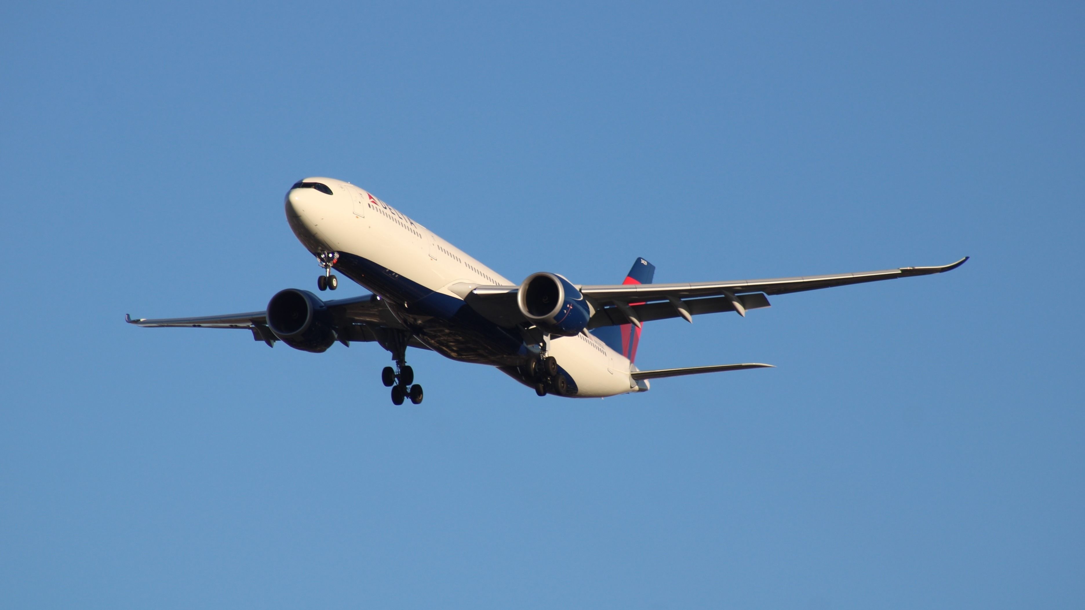 Delta Air Lines Airbus A330-900 landing at New York John F. Kennedy International Airport JFK shutterstock_2563510801