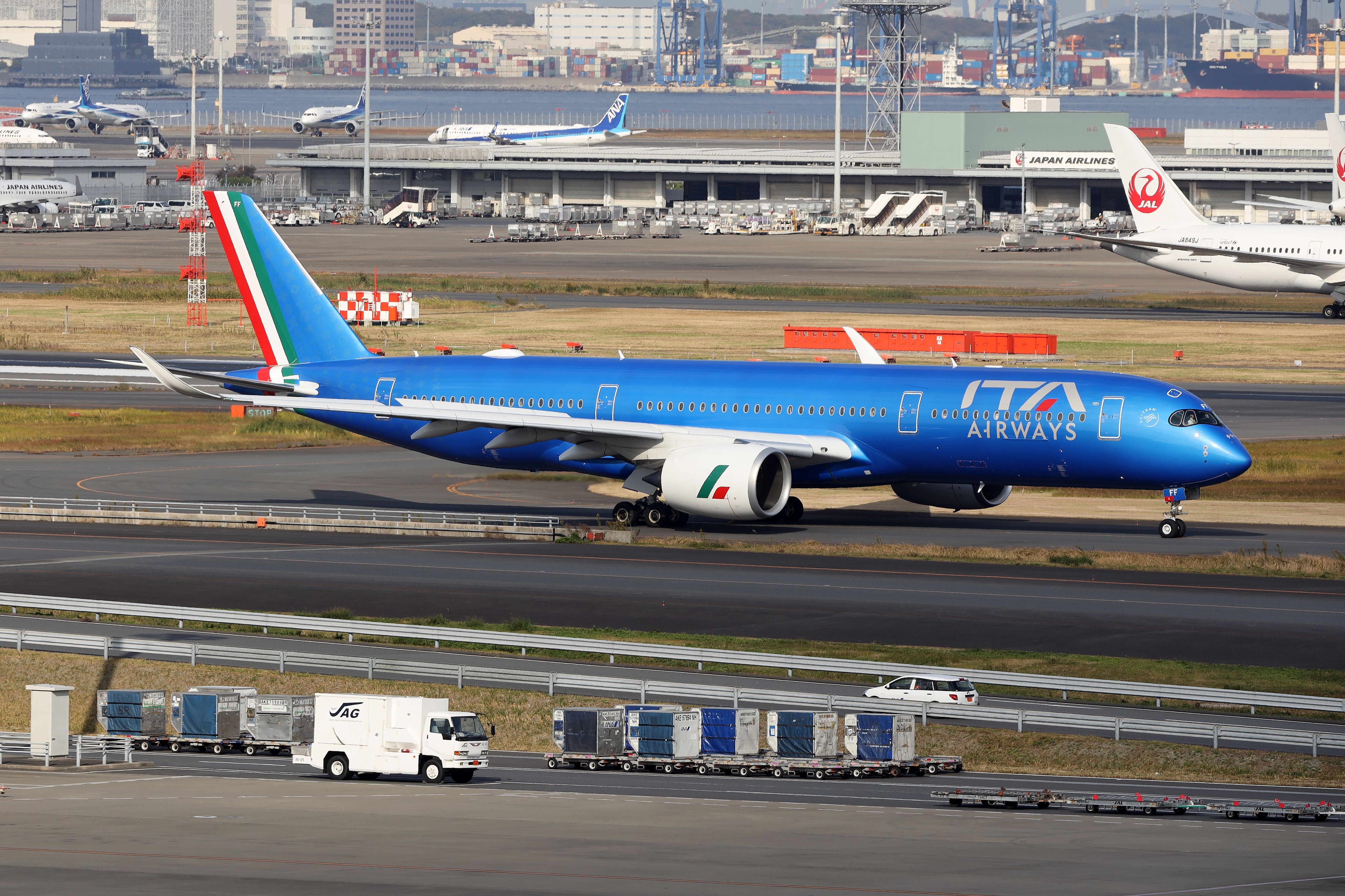 ITA Airways Airbus A350-900 at Tokyo Haneda Airport HND shutterstock_2292647697