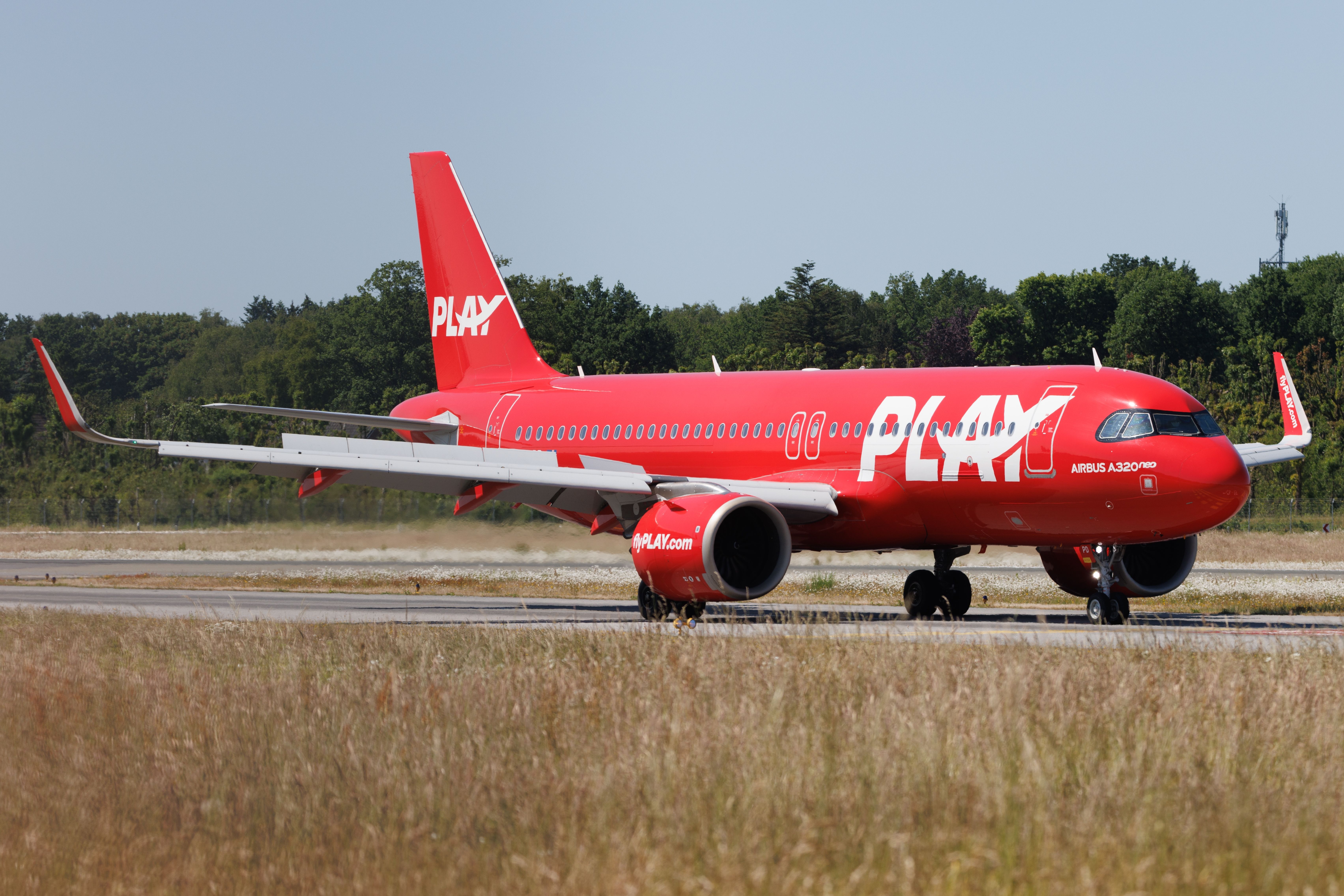 PLAY Airbus A320 taxiing in Hamburg shutterstock_2344632587