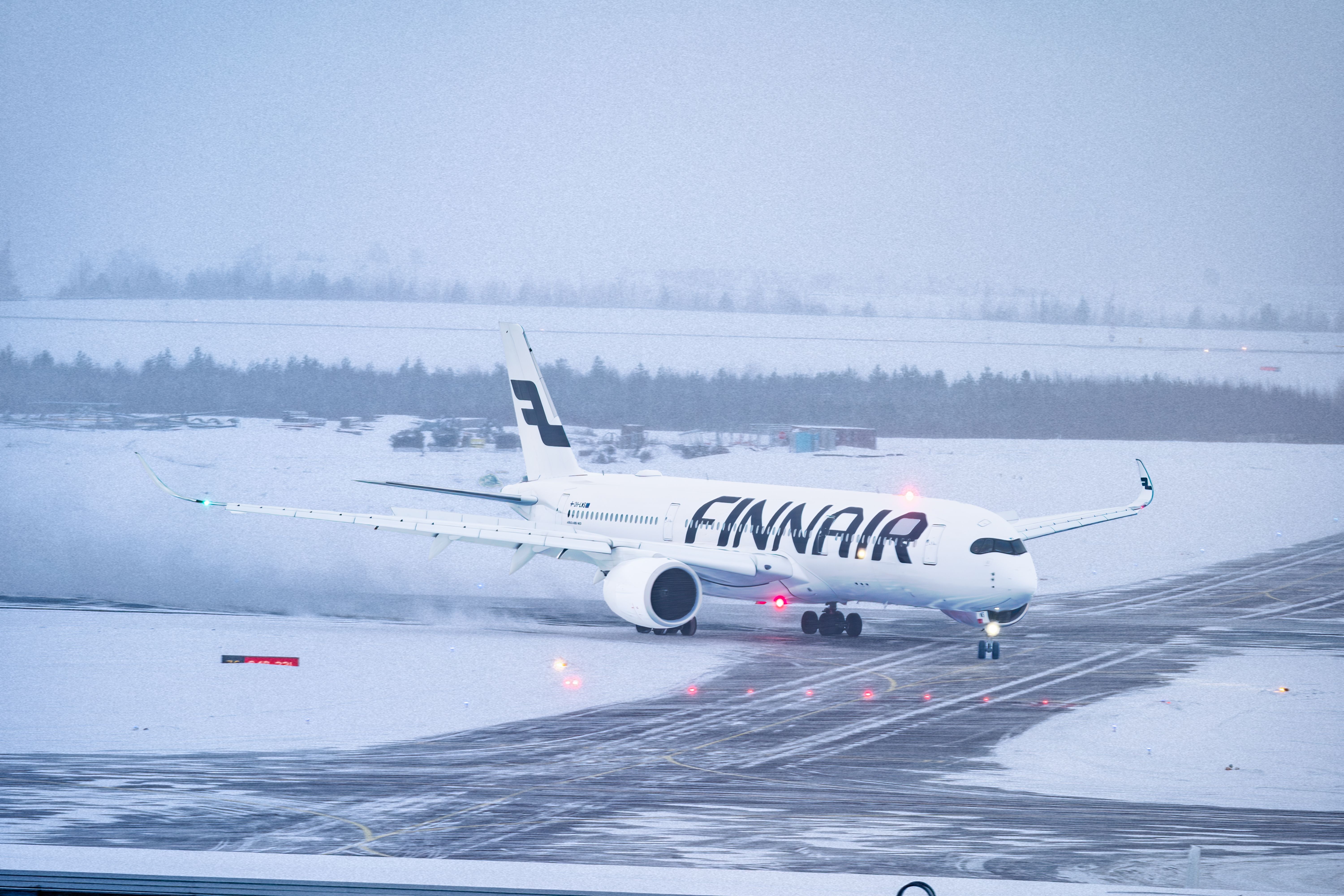 Finnair Airbus A350 Taxiing In The Snow At Helsinki Airport