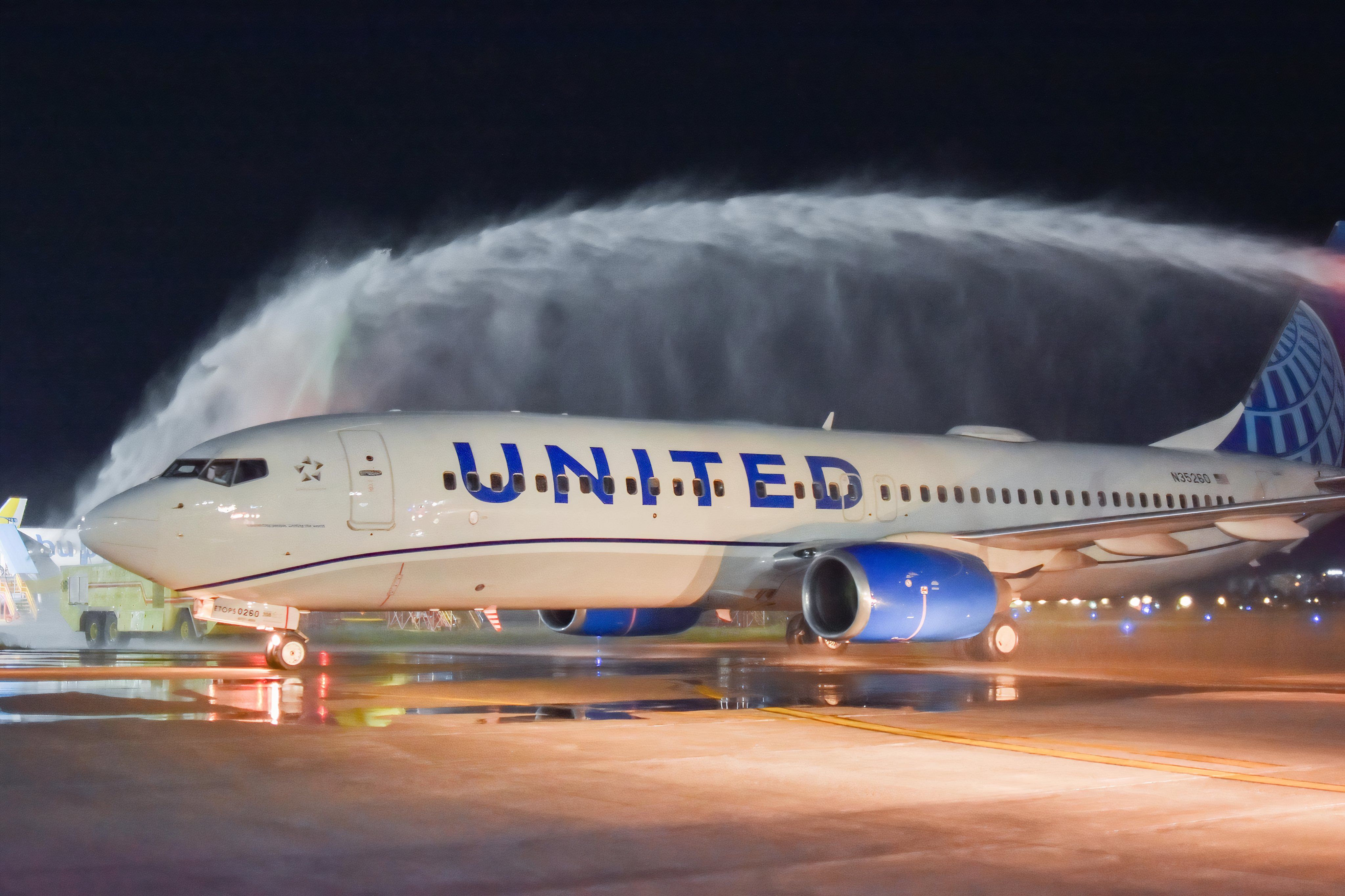 United Airlines 737-800 water arch