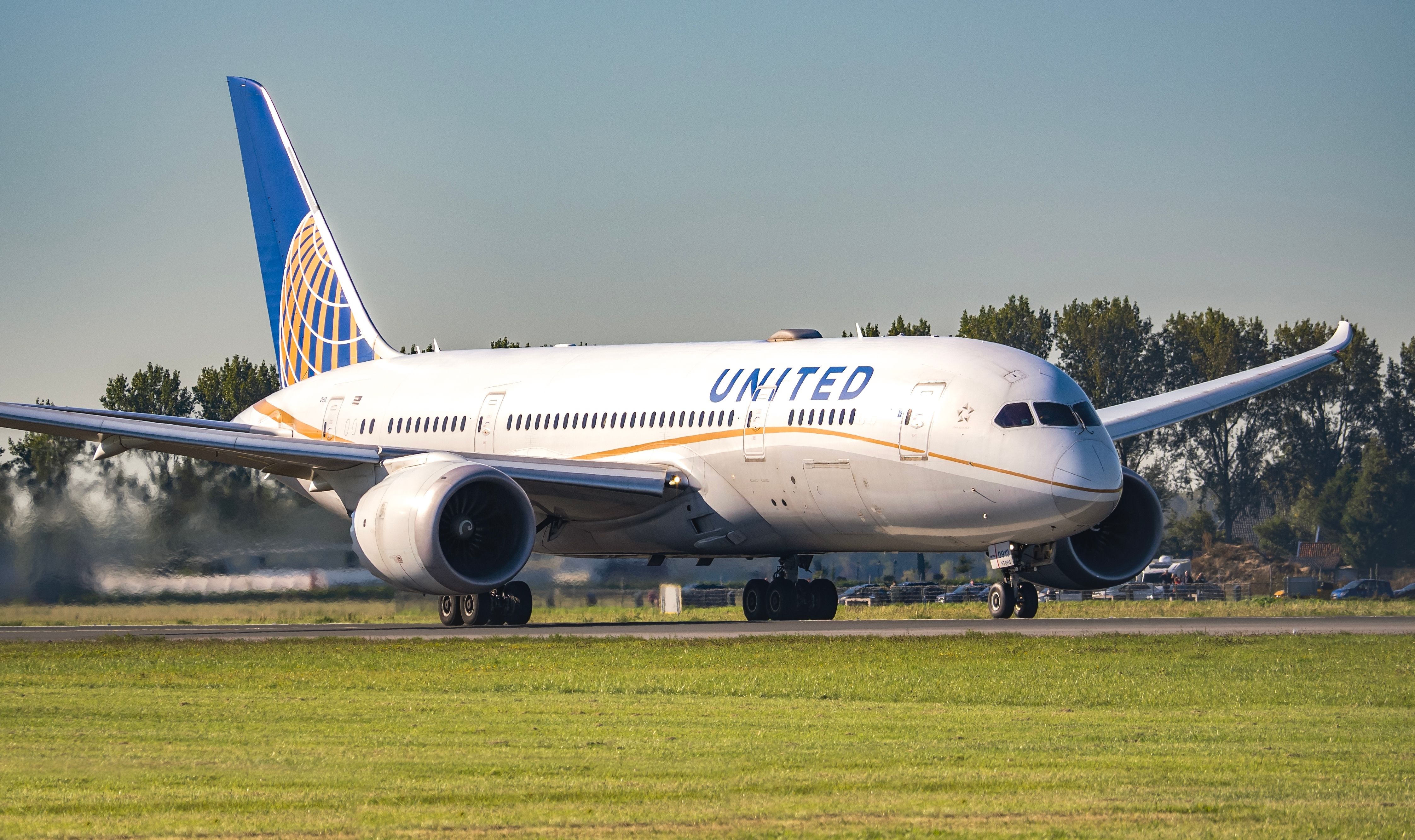 United Airlines Boeing 787-8 taxiing at Amsterdam Schiphol Airport AMS shutterstock_2568718701