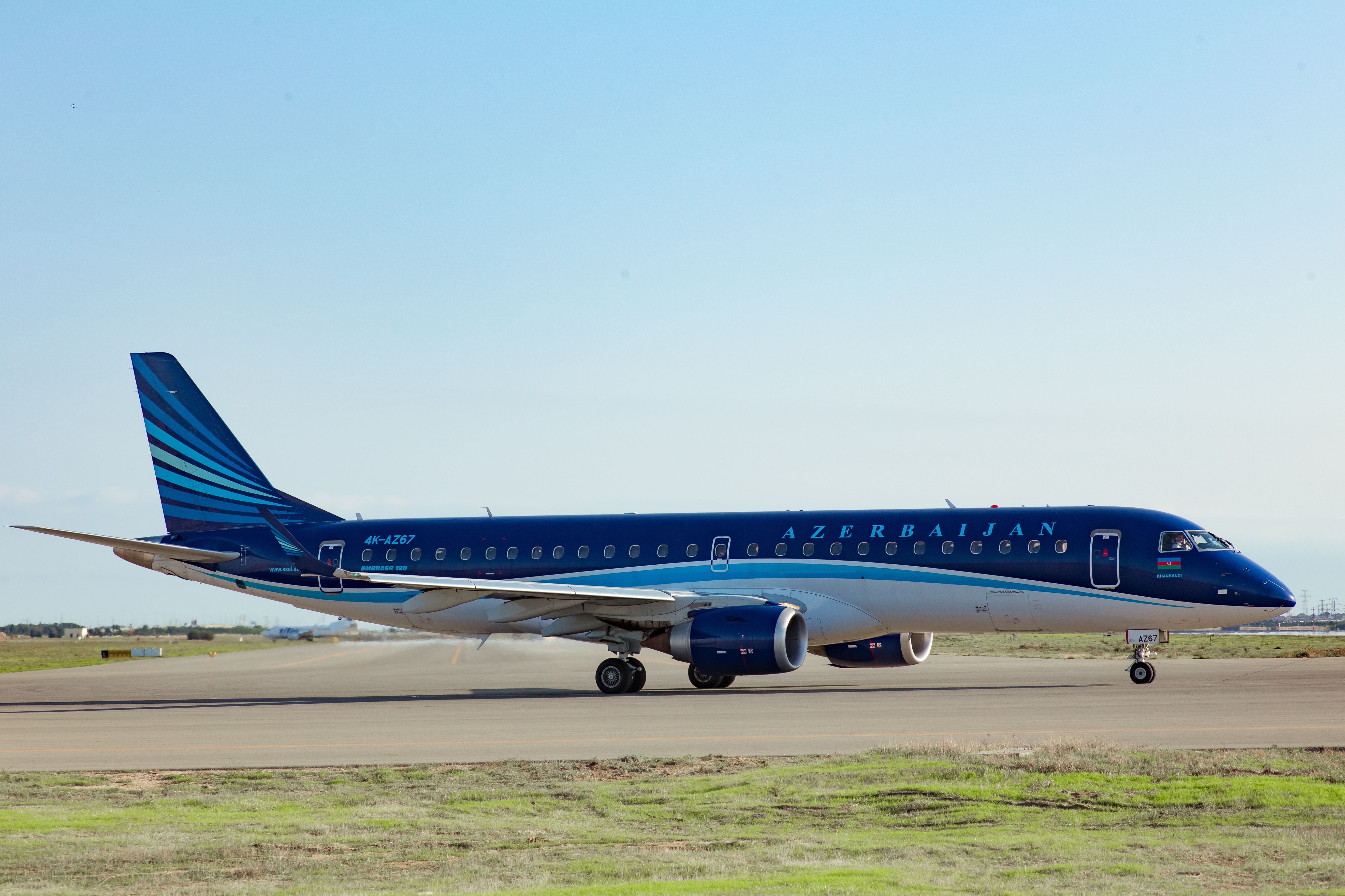 Azerbaijan Airlines Embraer E190 taxiing at GYD shutterstock_741077692