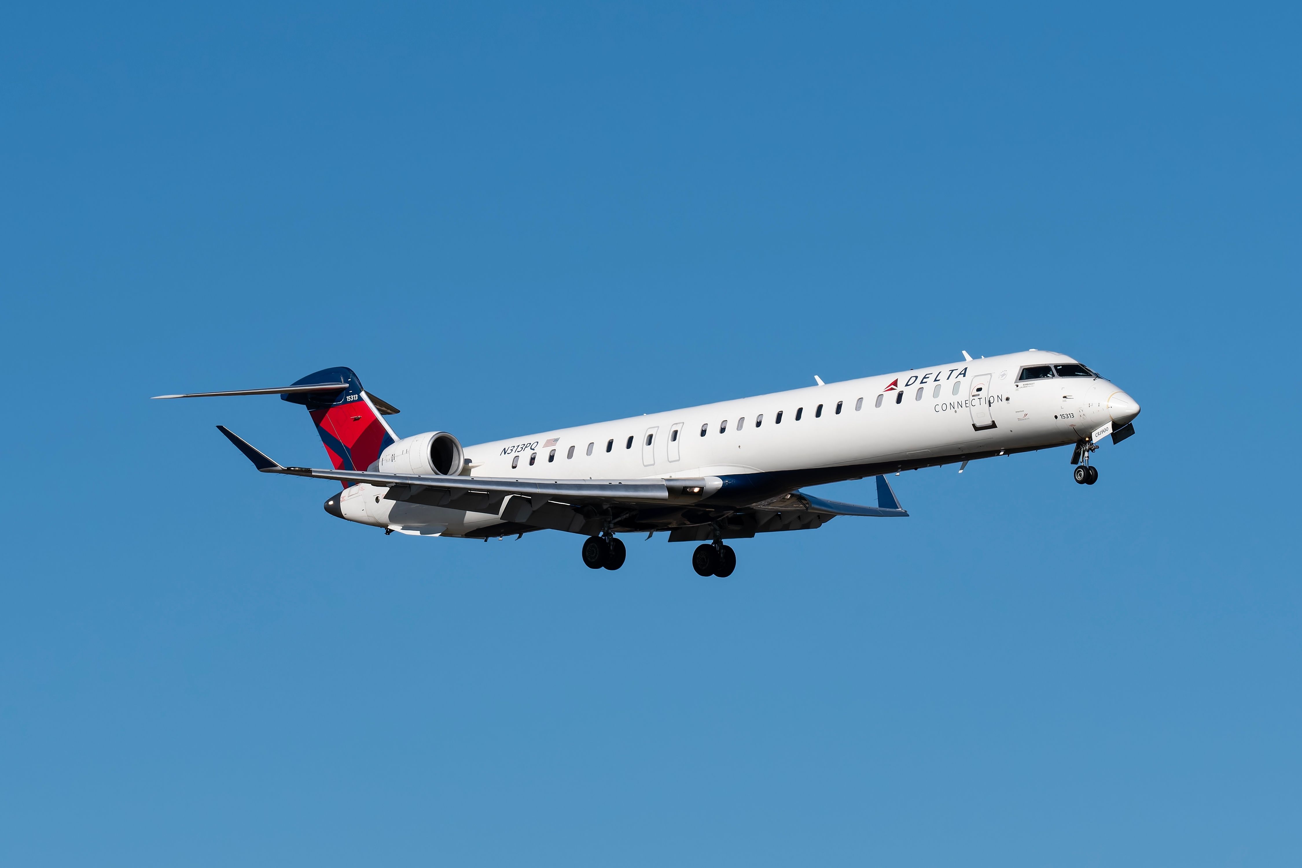 Delta Air Lines CRJ900 landing at PHX shutterstock_2382886131