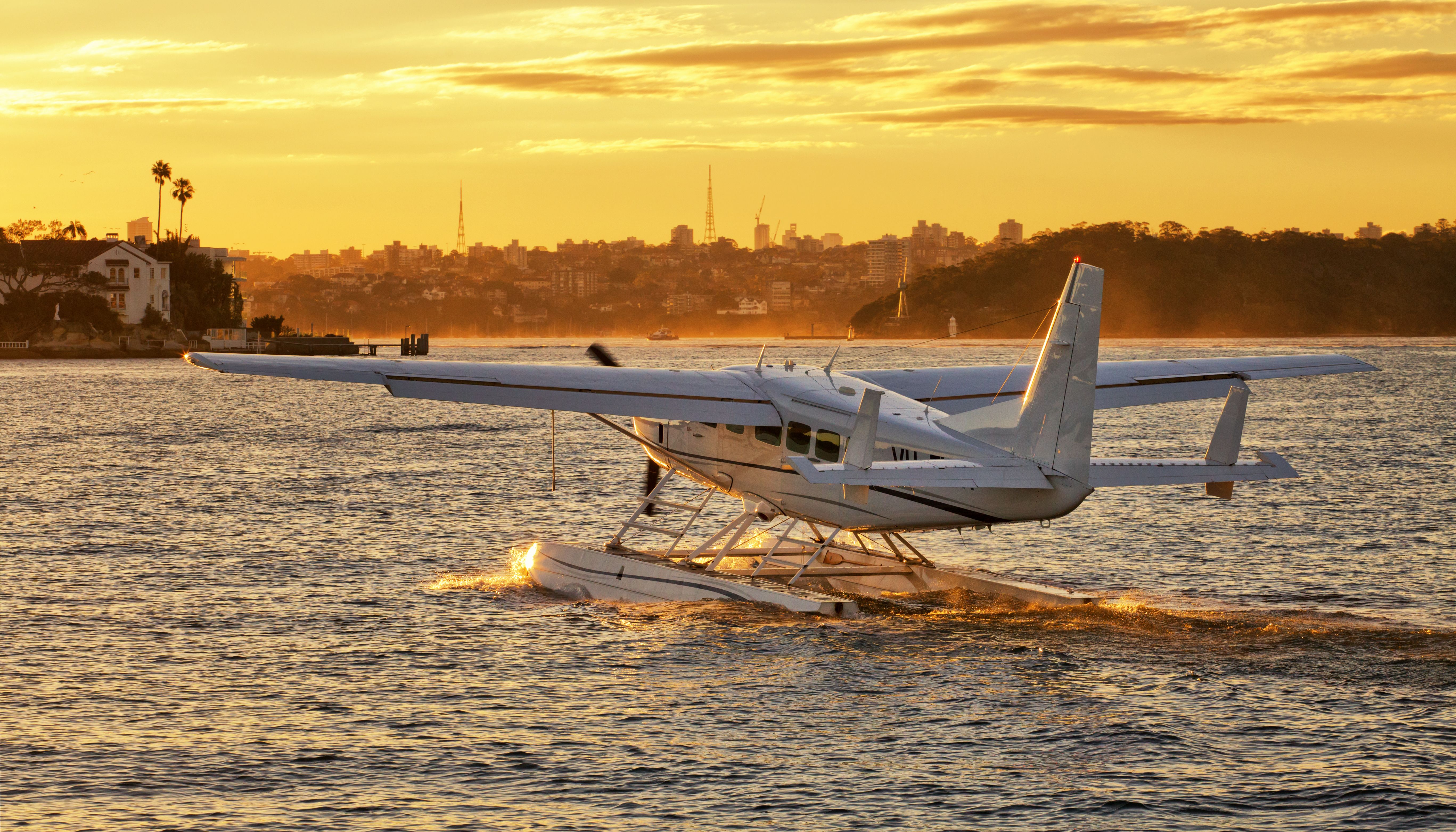 Cessna 208 Floatplane At Sunset