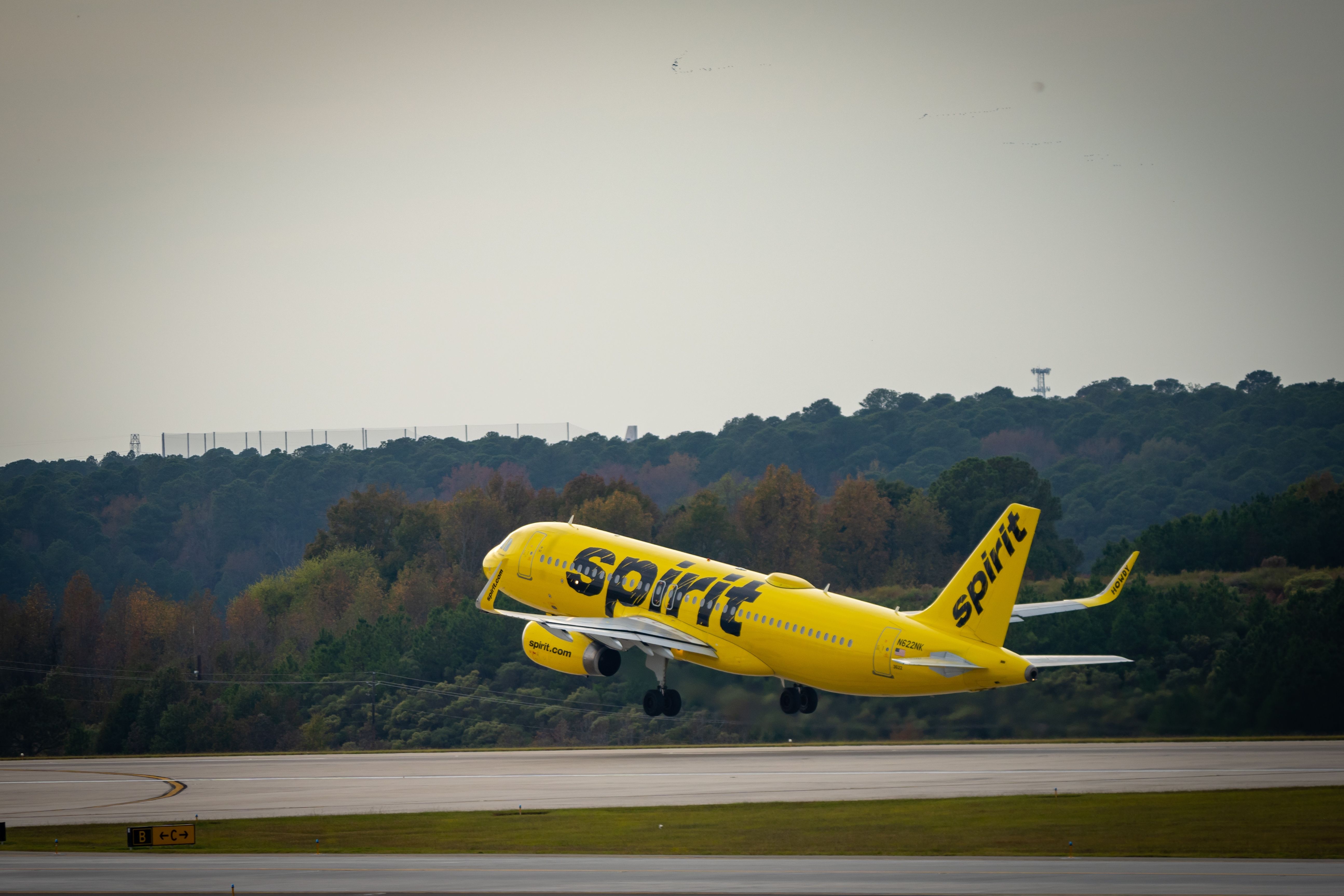 Morrisville, NC USA, 4-28-2022: Spirit airlines passenger jet during takeoff at KRDU.