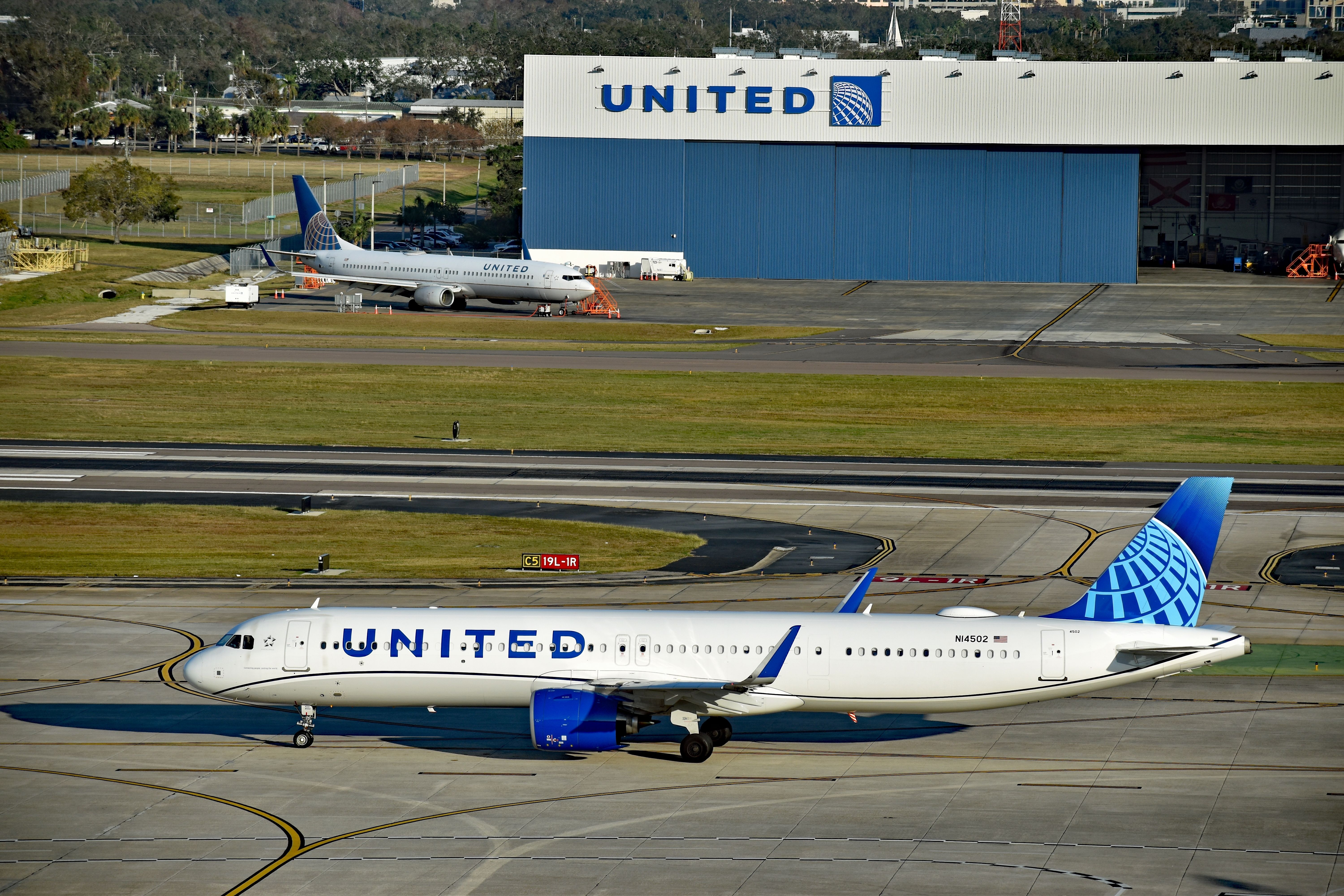 United Airlines Airbus A321neo taxiing at Tampa International Airport TPA shutterstock_2580285085