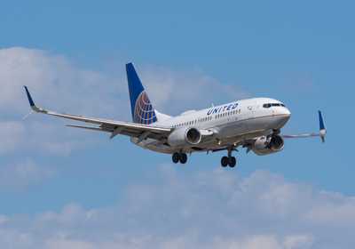 United Airlines Boeing 737-700 landing at Toronto Pearson International Airport YYZ shutterstock\_2404382501