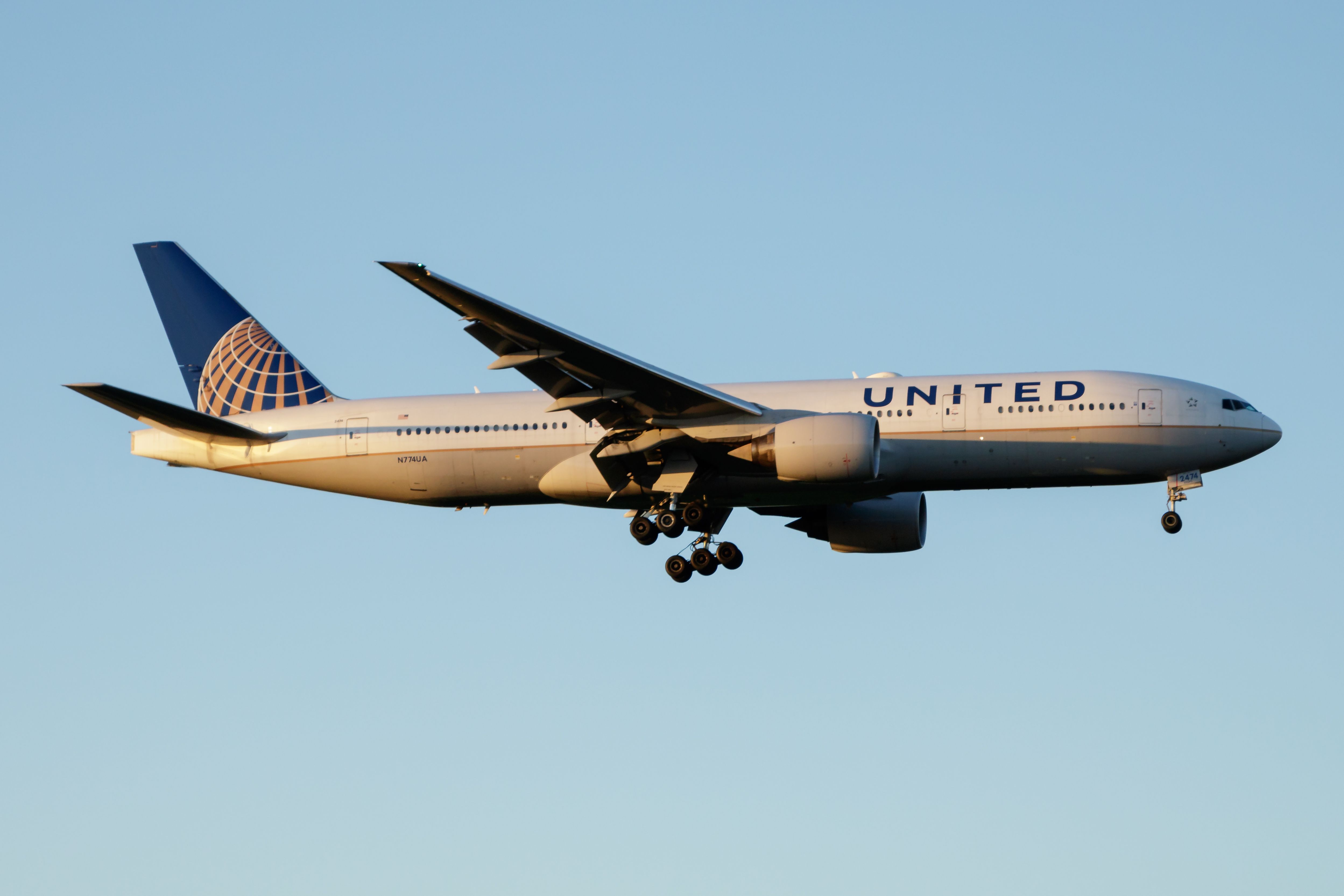 United Airlines Boeing 777-200 landing at London Heathrow Airport LHR 