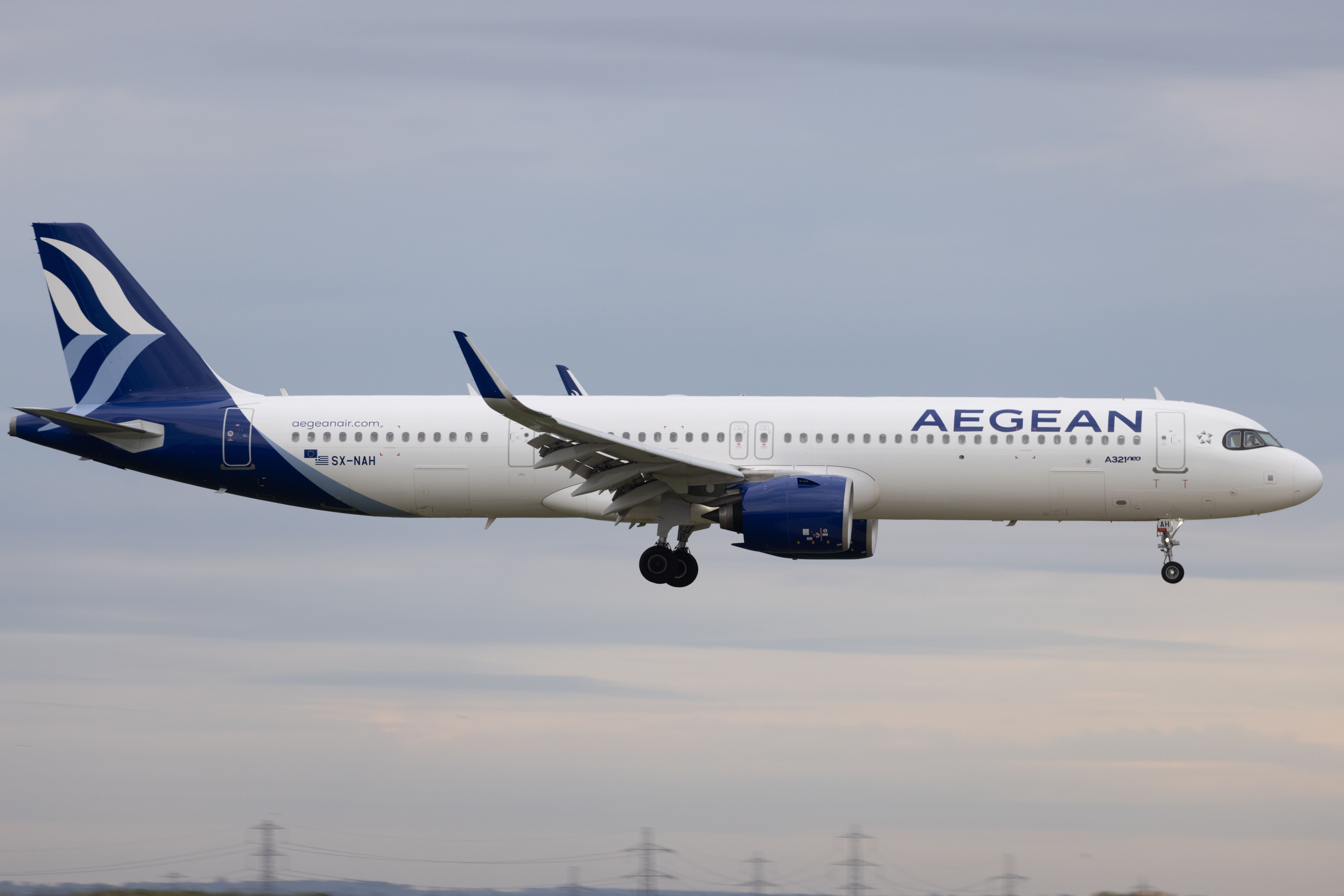 AEGEAN Airbus A321neo landing at London Heathrow Airport LHR shutterstock_2368775953