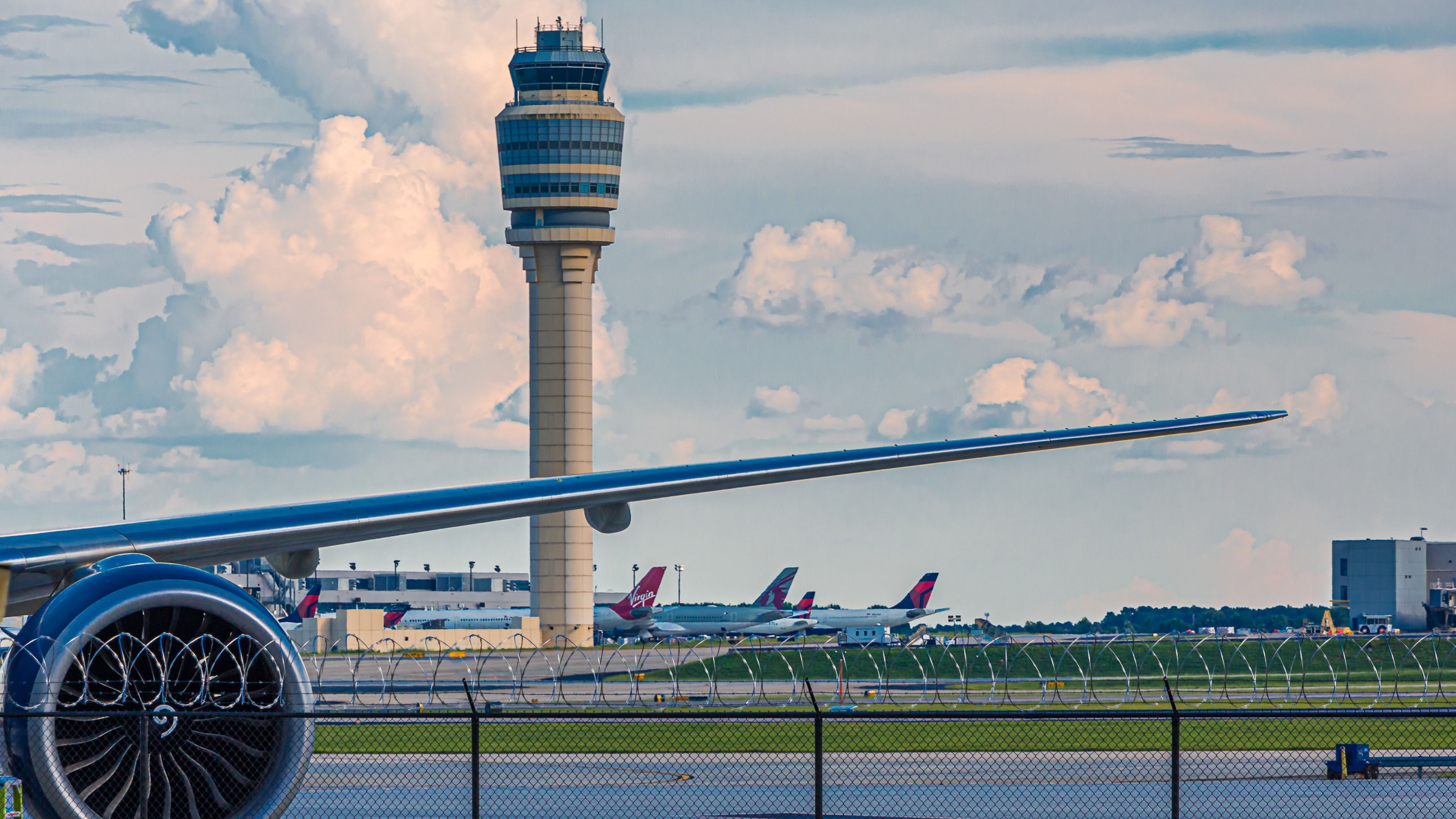 ATC tower at Hartsfield-Jackson Atlanta International Airport ATL shutterstock_1676976958