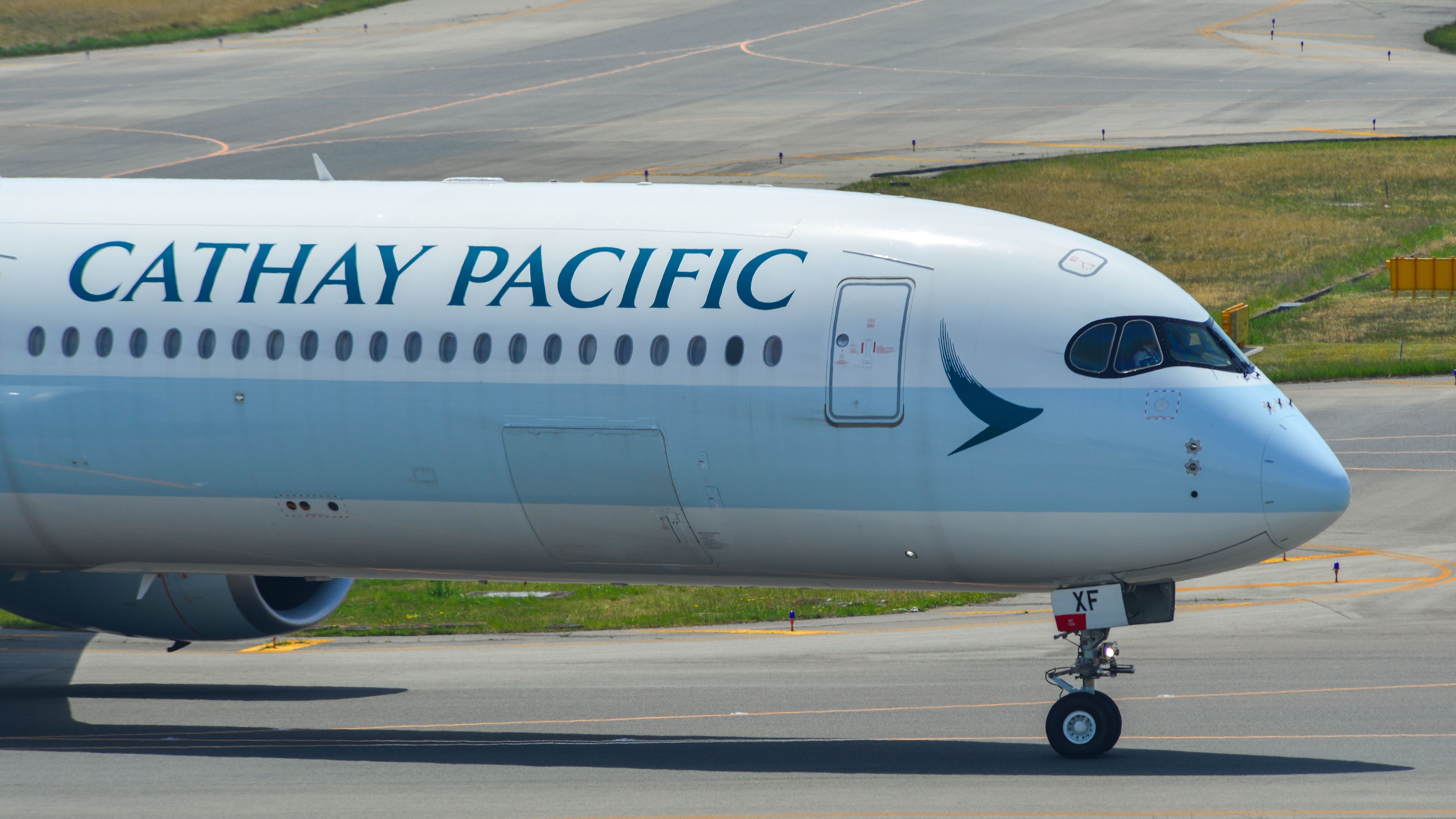 Cathay Pacific Airbus A350-1000 taxiing shutterstock_1422528719