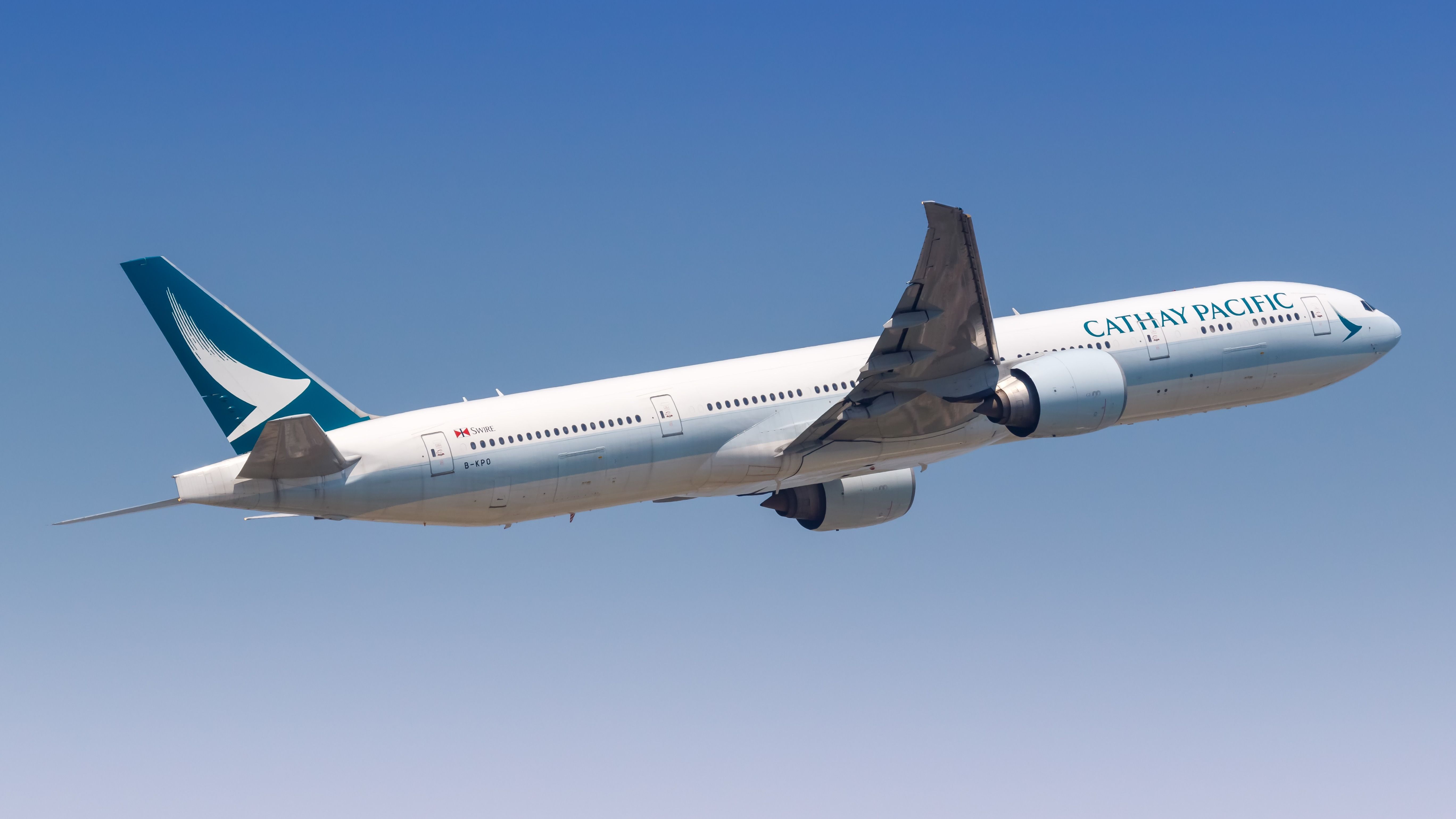 Cathay Pacific Boeing 777-300ER departing HKG shutterstock_1539390197