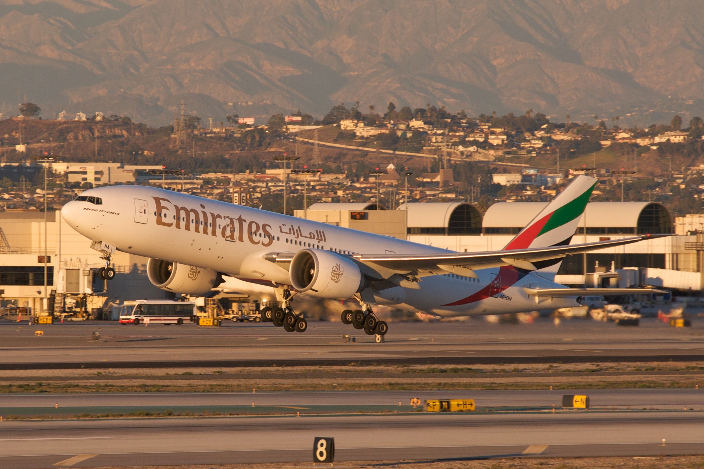 Emirates_A6-EWA_Boeing_777-200LR_taking_off_from_LAX