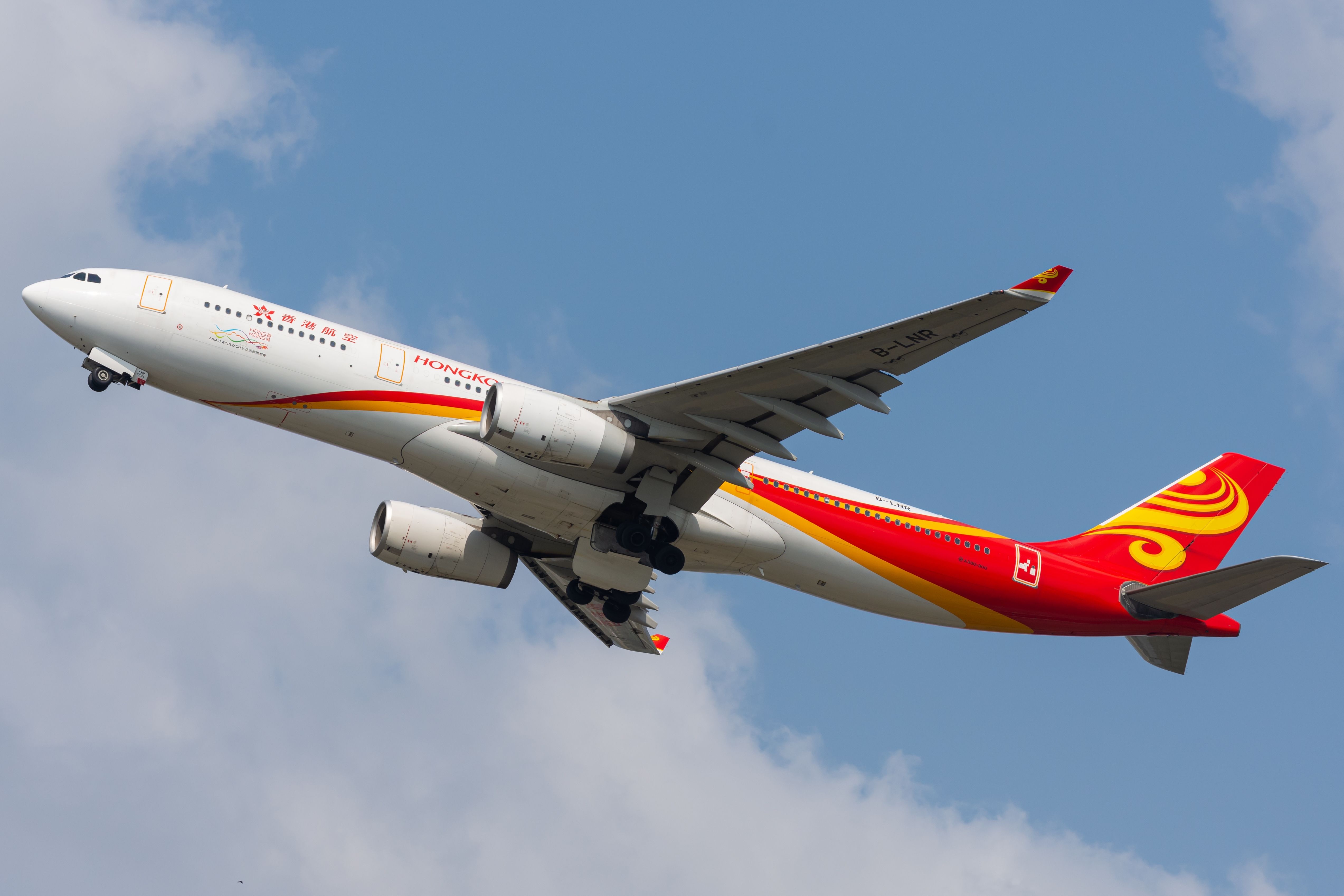 Hong Kong Airlines Airbus A330-300 departing BKK shutterstock_2355759011
