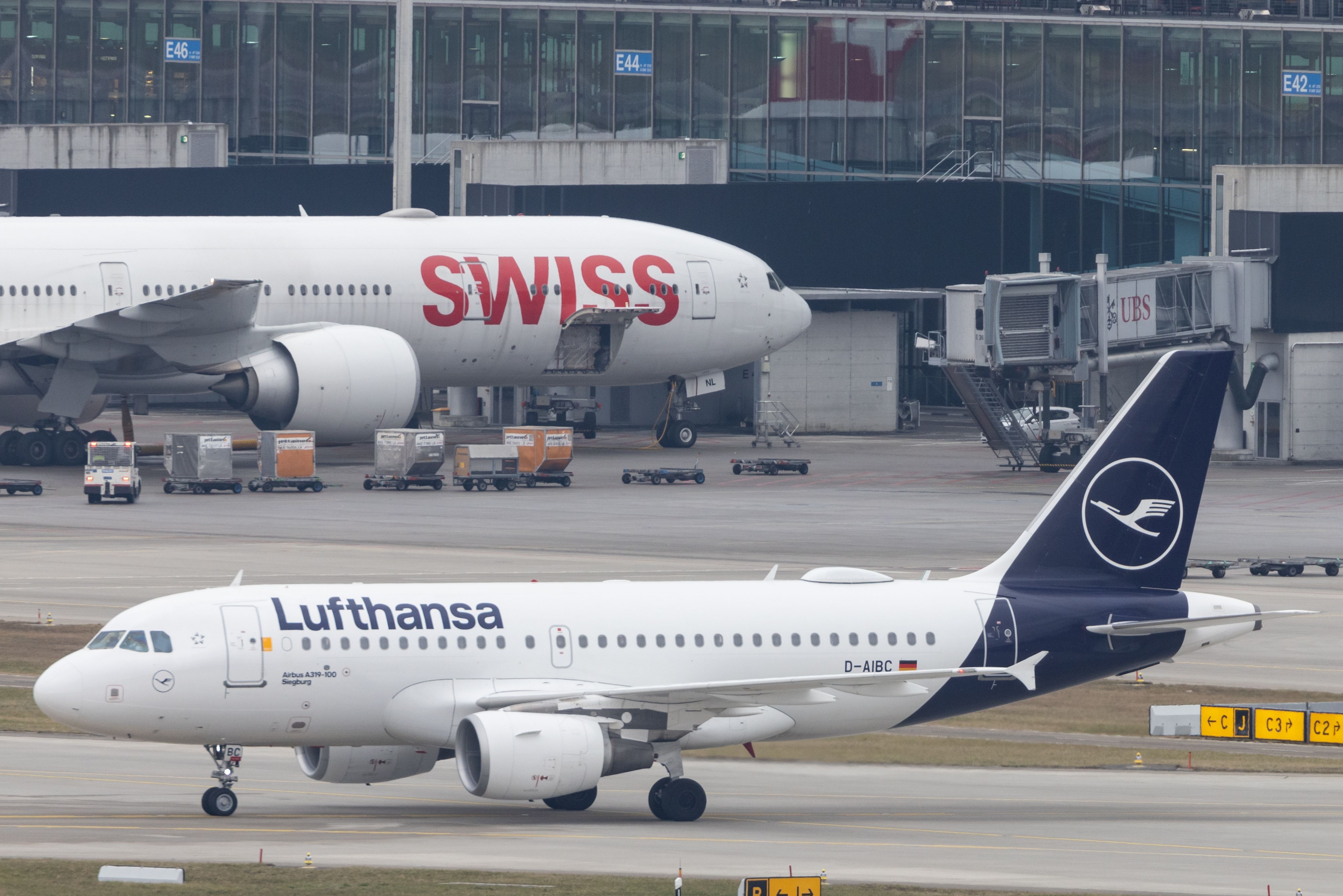 Lufthana and SWISS aircraft at Zurich Airport ZRH shutterstock_2400018357