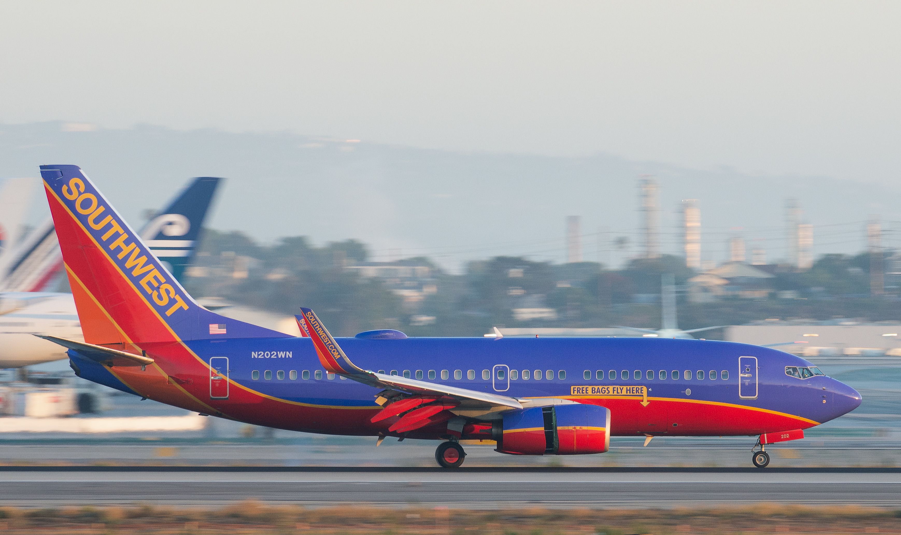 Southwest Airlines Boeing 737 with Free Bags Fly Here sticker shutterstock_1298094877