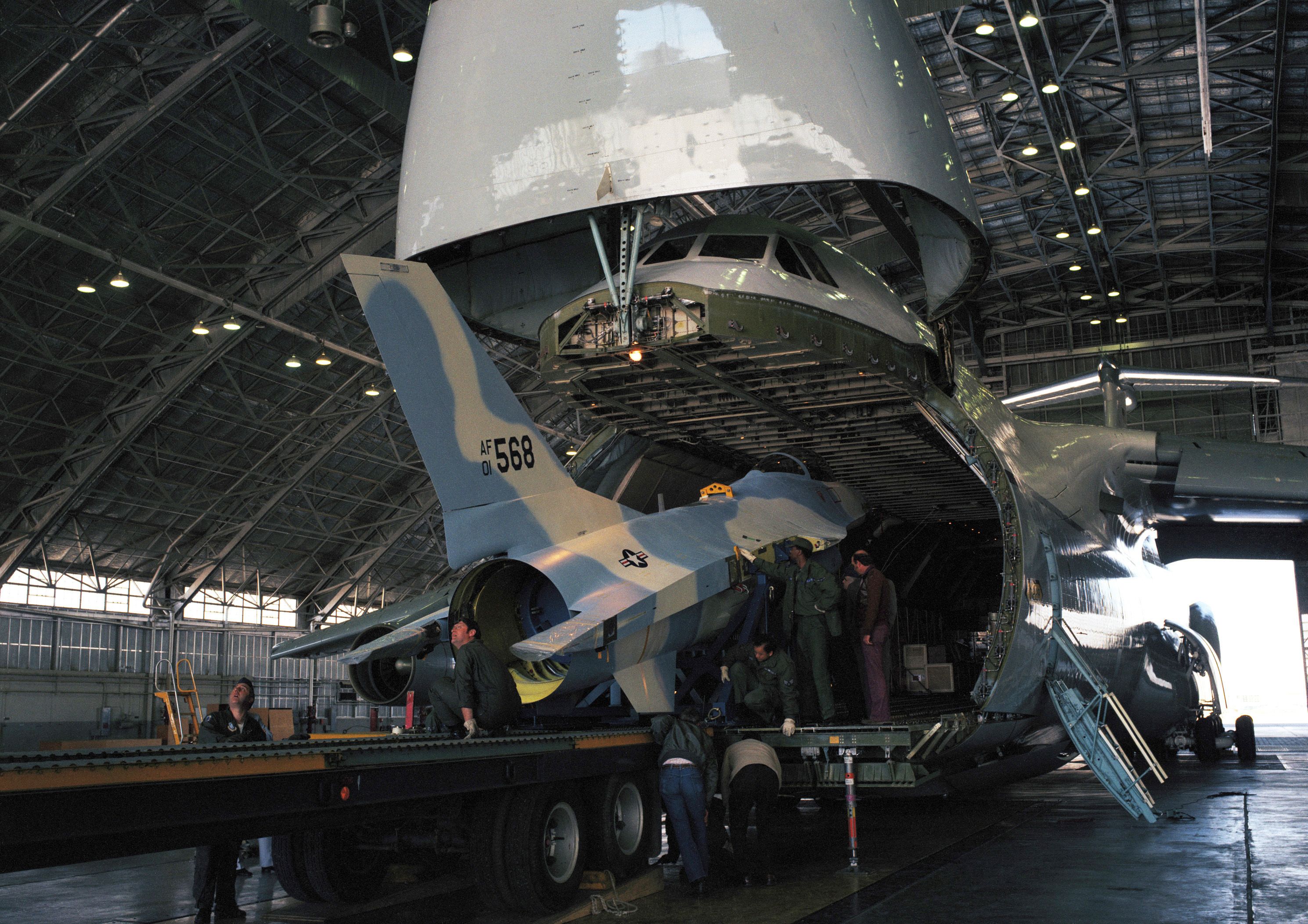 The YF-16 plane is discharged from the C-5A galaxy