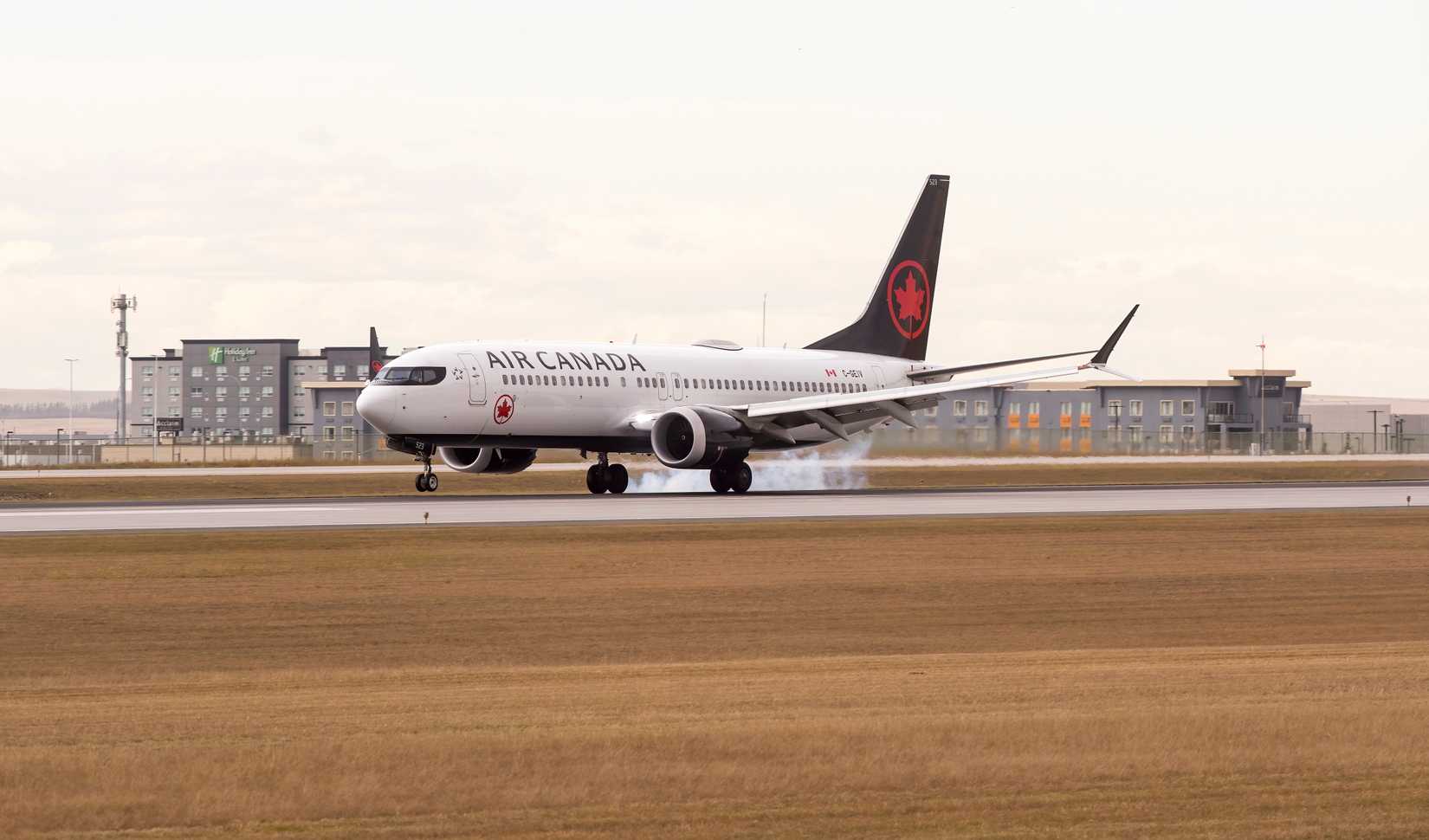 Air Canada Boeing 737 MAX 8 landing at YYC shutterstock_2378141067