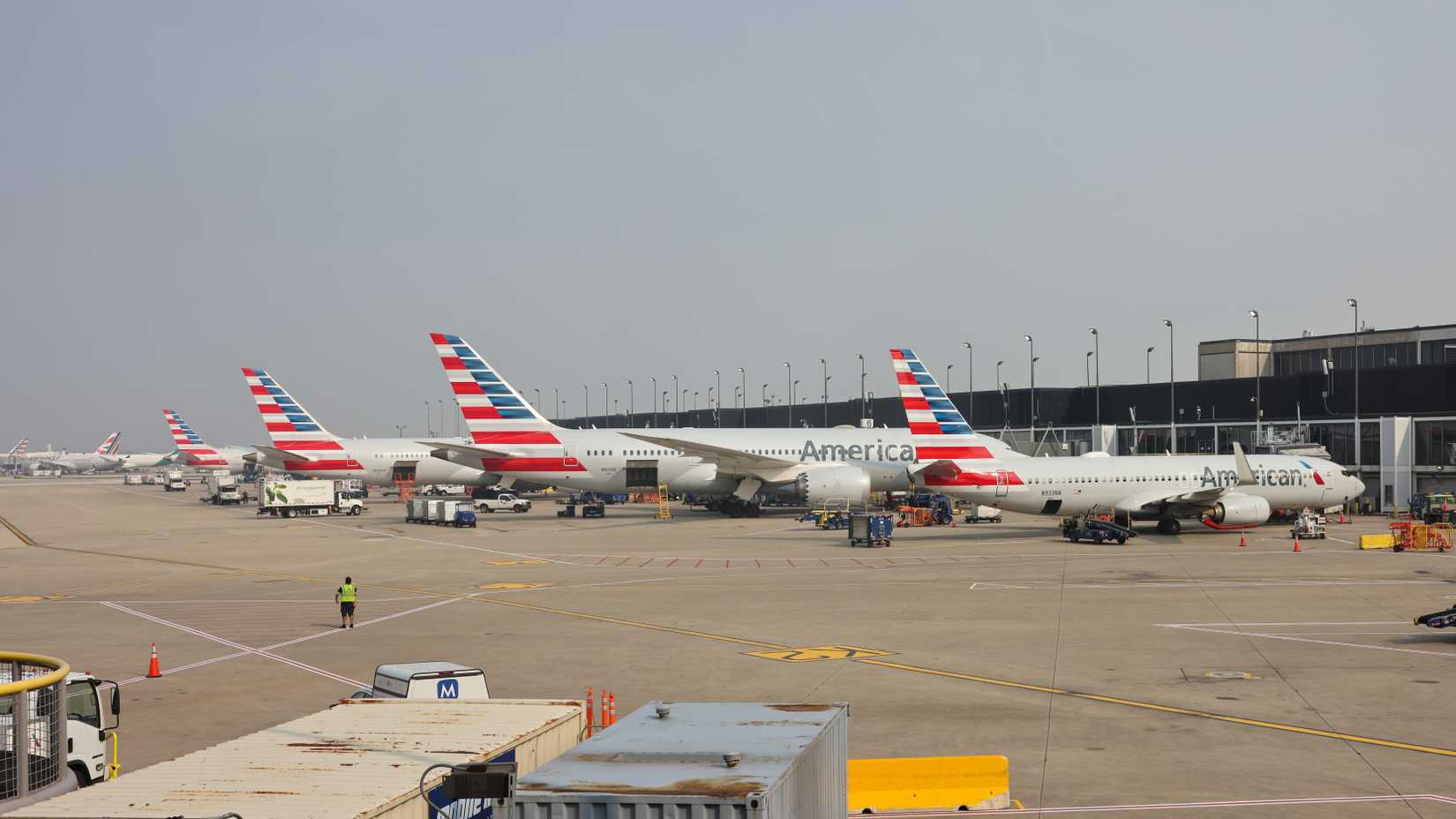 American Airlines aircraft at the gates at Chicago O'Hare International Airport ORD shutterstock_2376424249