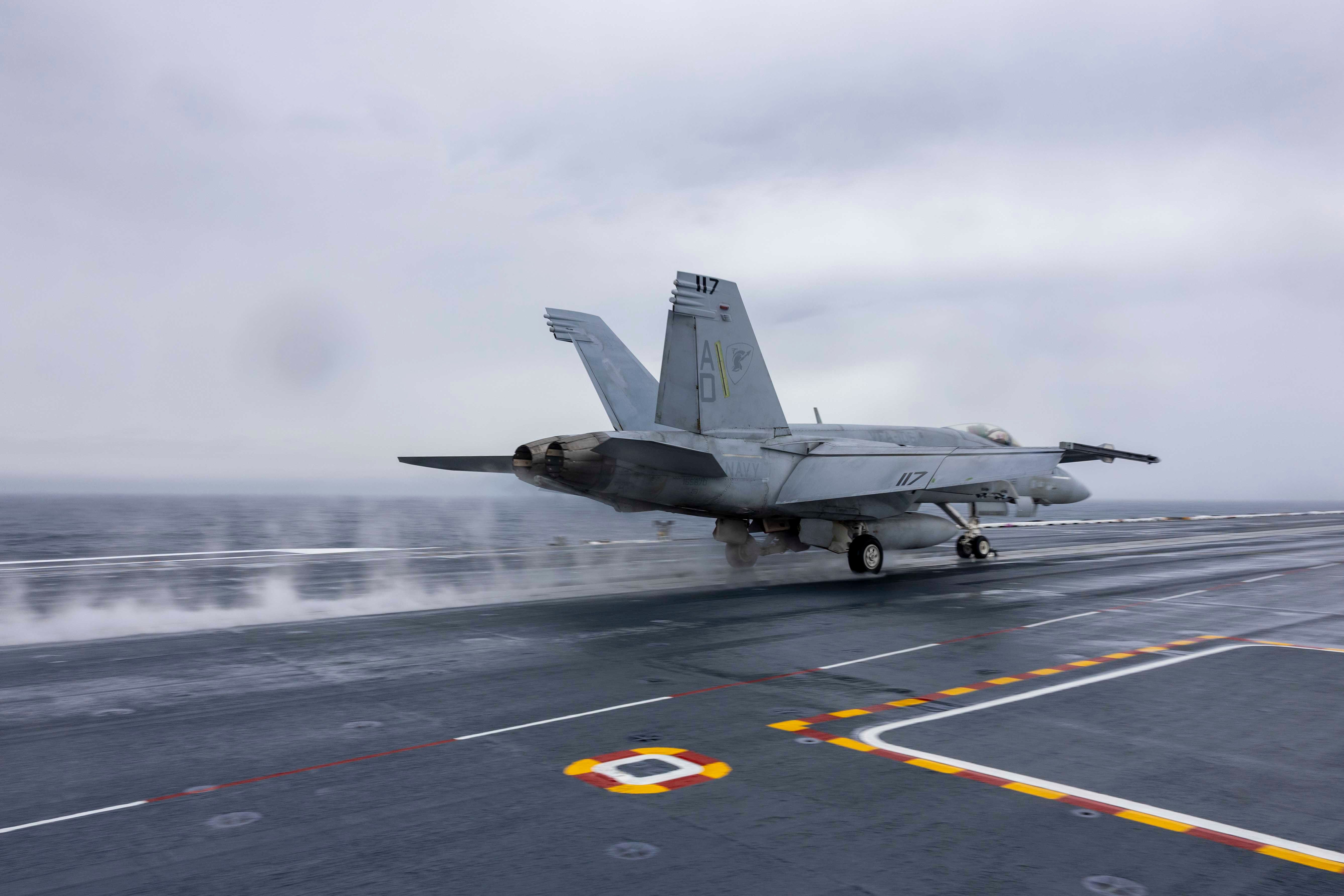 An F_A-18F Super Hornet attached to the “Gladiators” of Strike Fighter Squadron (VFA) 106