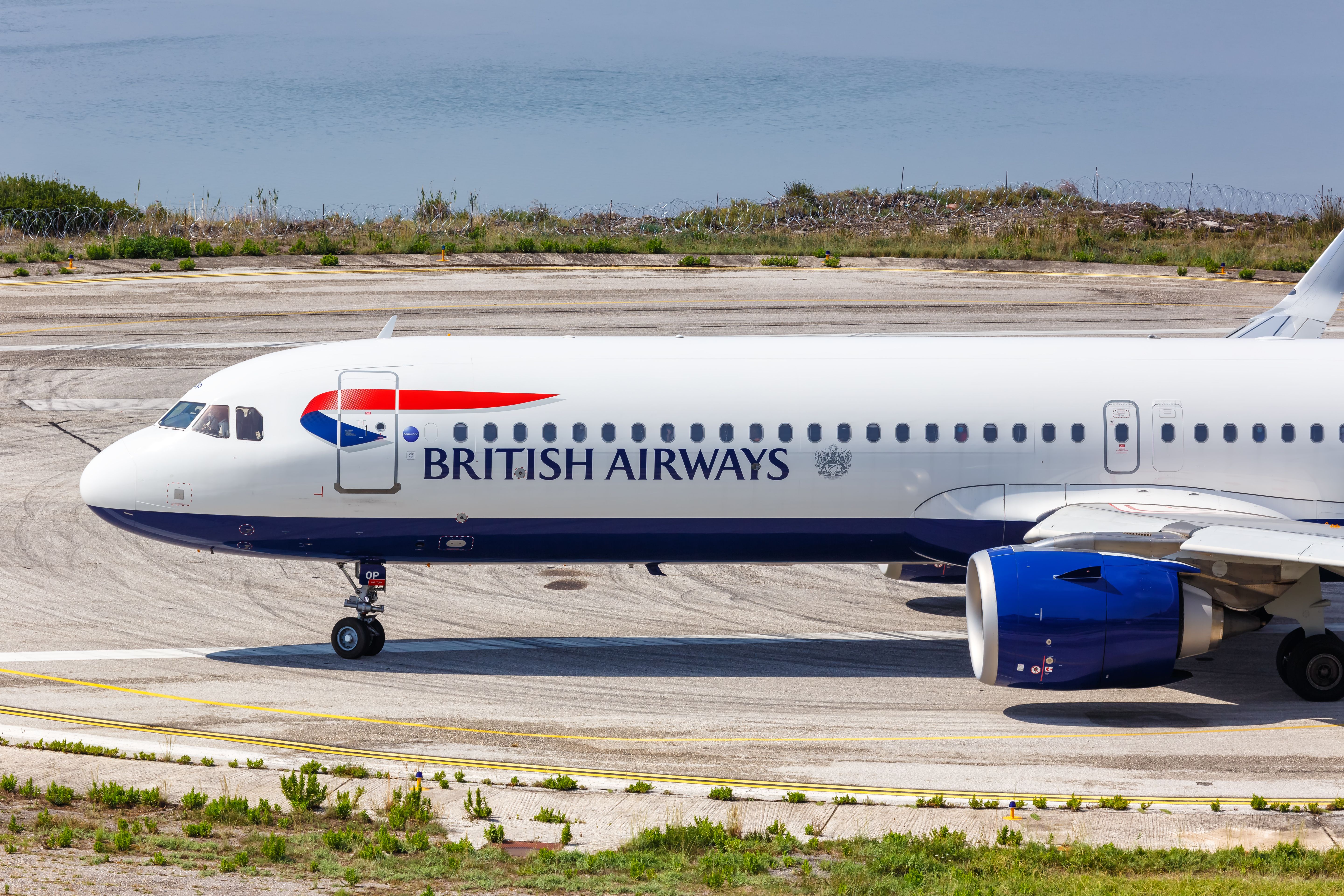 British Airways Airbus A321neo taxiing at Corfu Airport CFU shutterstock_1822602899