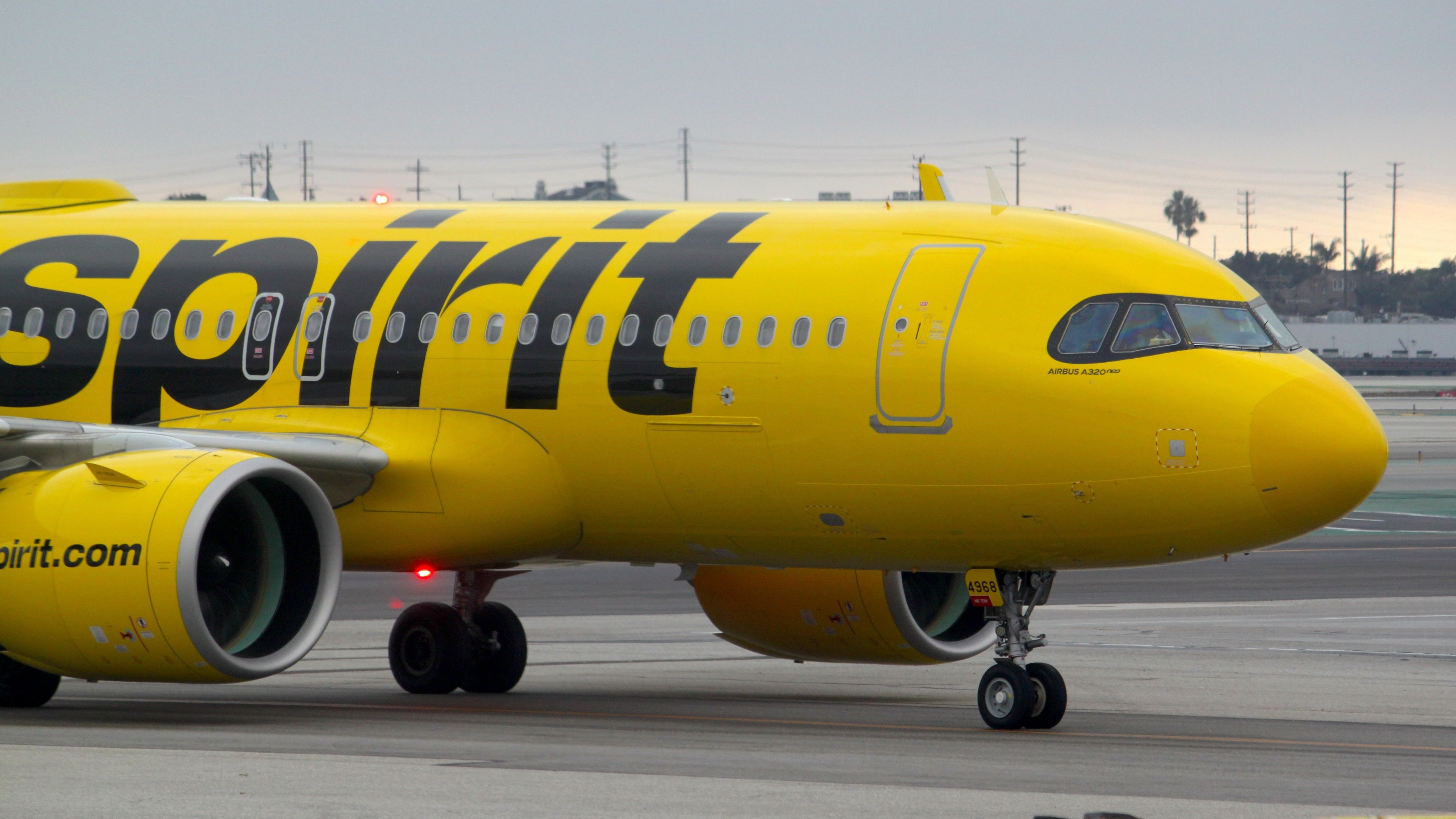 Spirit Airlines Airbus A320neo taxiing at LAX shutterstock_2581360133