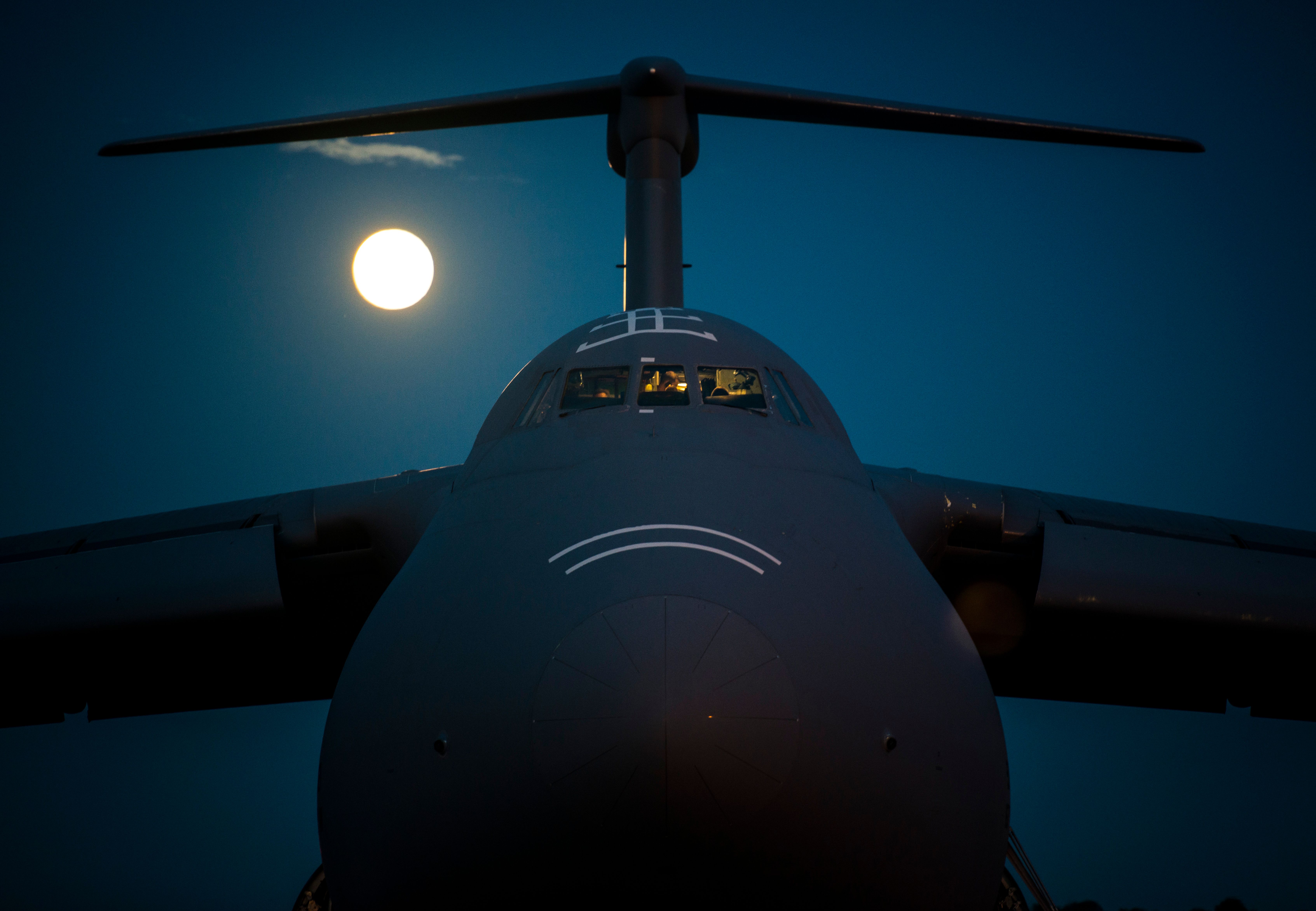 The Moon is rising as members of West Virginia Air Nation Aircrew with the sixteenth air wing of Martinsburg, WW.