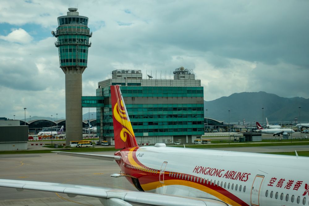 The Hong Kong Airlines airplane is parking on the Hong Kong International Airport