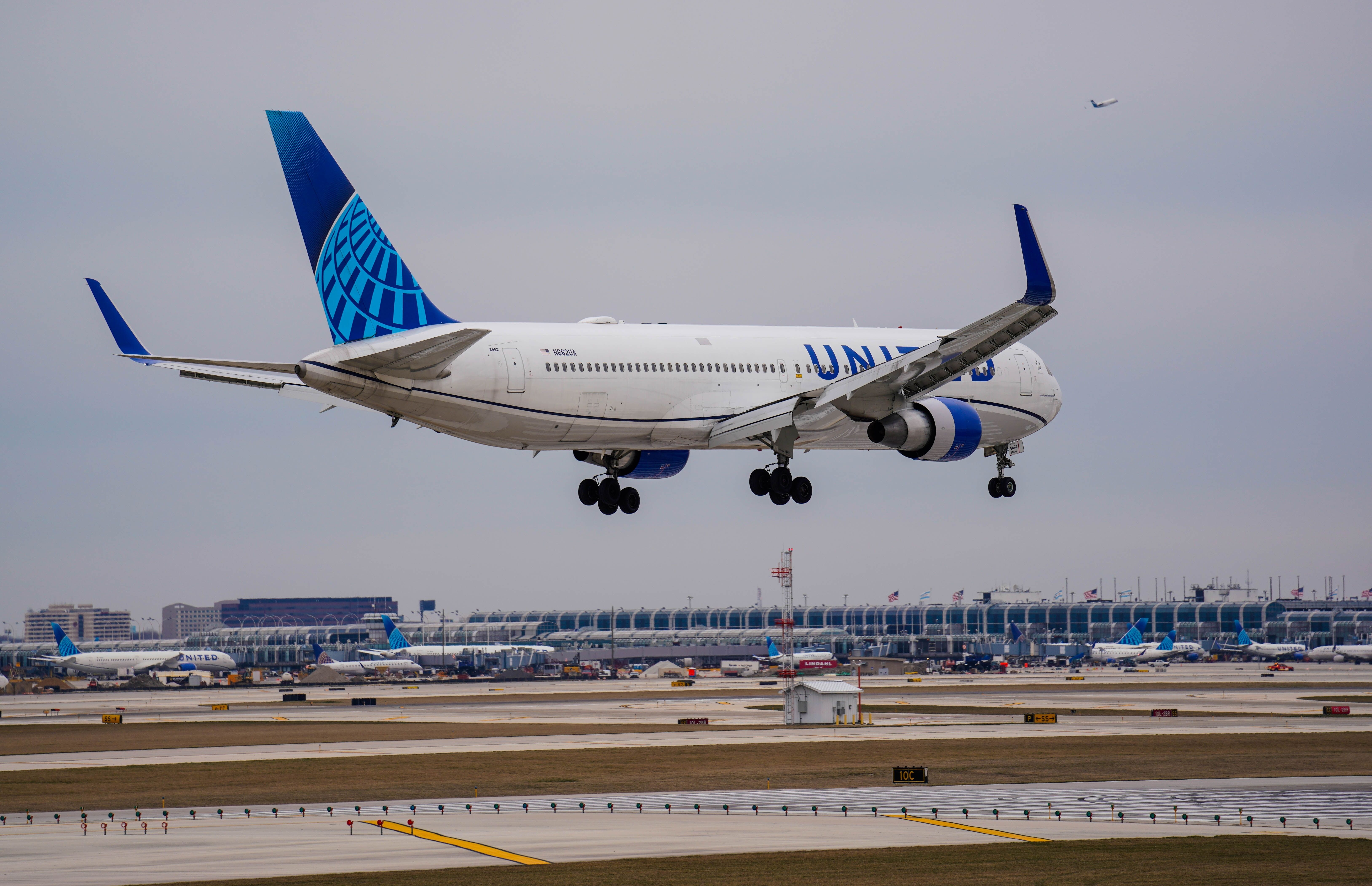 United Airlines Boeing 767 landing at ORD shutterstock_2454628367