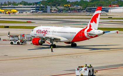Air Canada Rouge Airbus A319 at FLL shutterstock\_2596773367