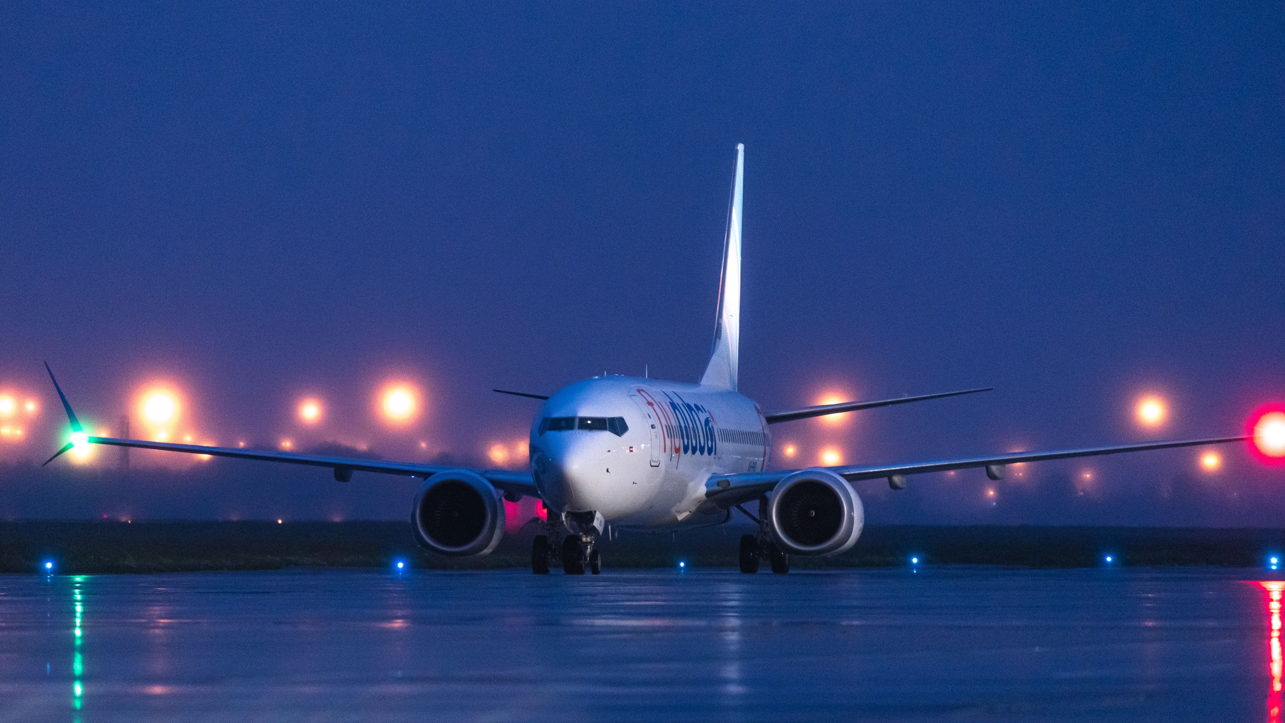 flyDubai Boeing 737 MAX 8 taxiing to the stand, Petersburg, Russia