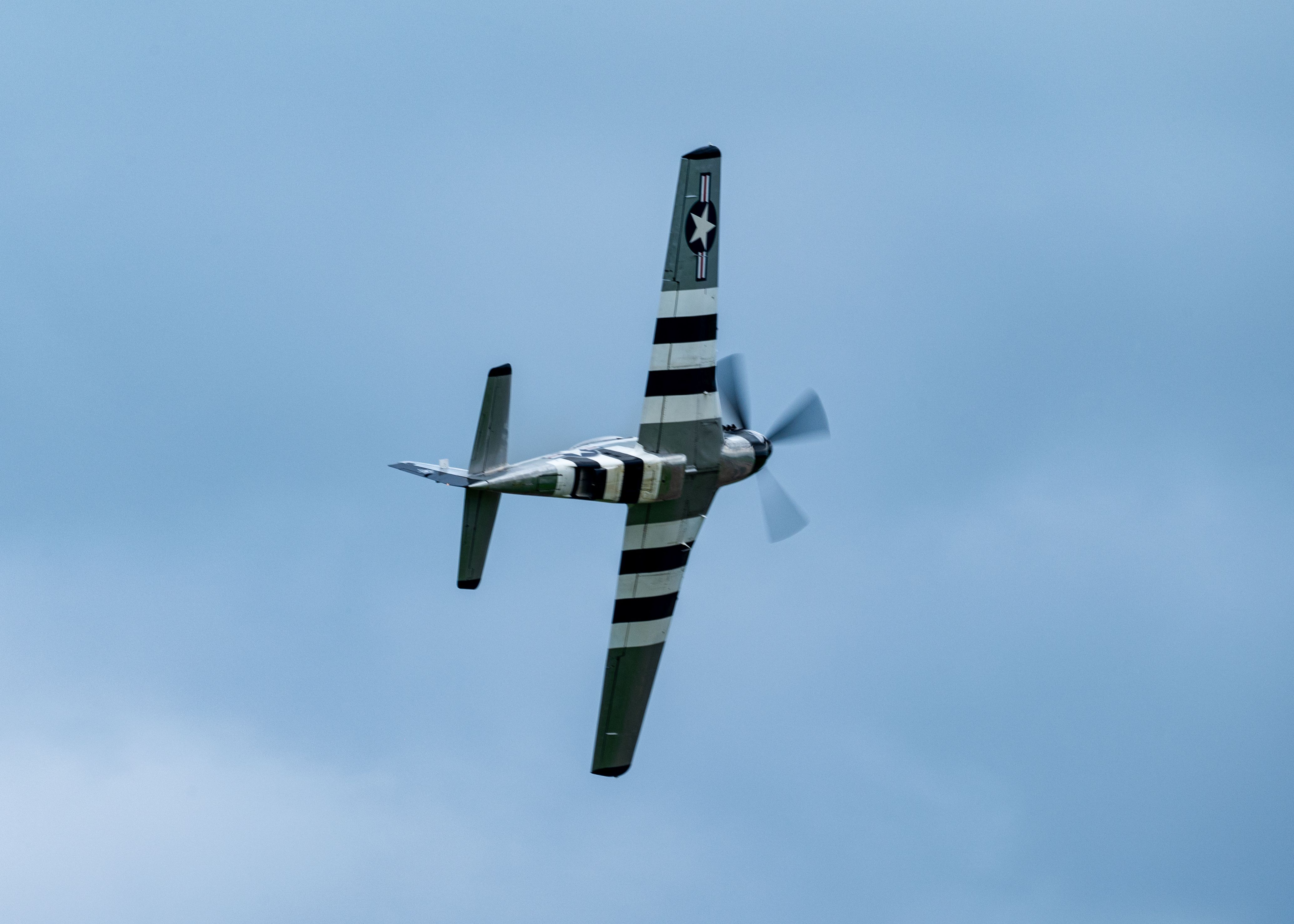 The “Quick Silver” P-51D Mustang piloted by Scott “Scooter” Yoak performs during the 2025 Defenders of Liberty Air Show at Barksdale Air Force Base, La.