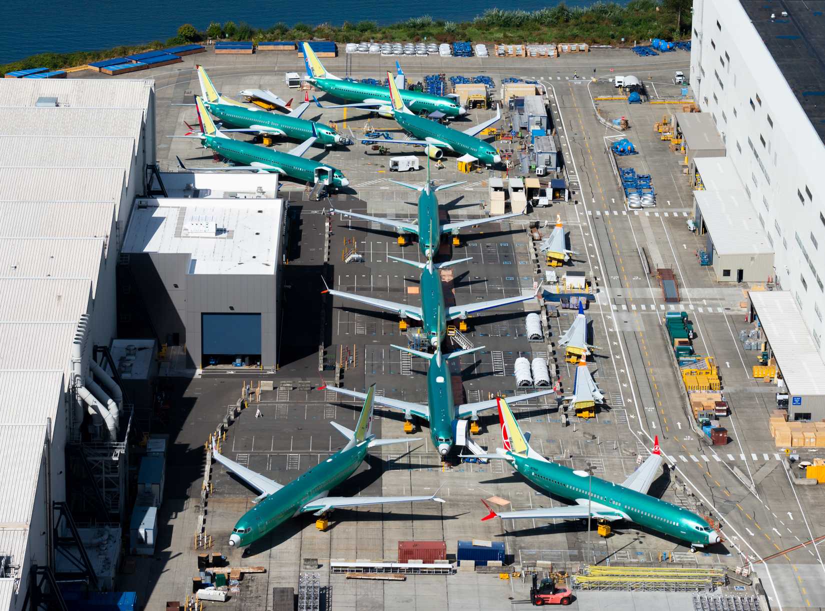 Multiple Boeing 737 MAX and NG parked outside the company factory at Renton Airport